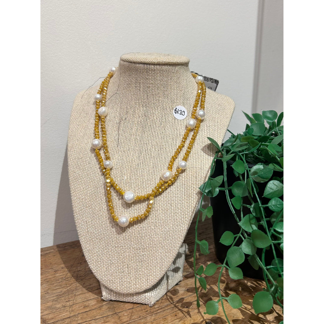 Yellow beaded pearl necklace