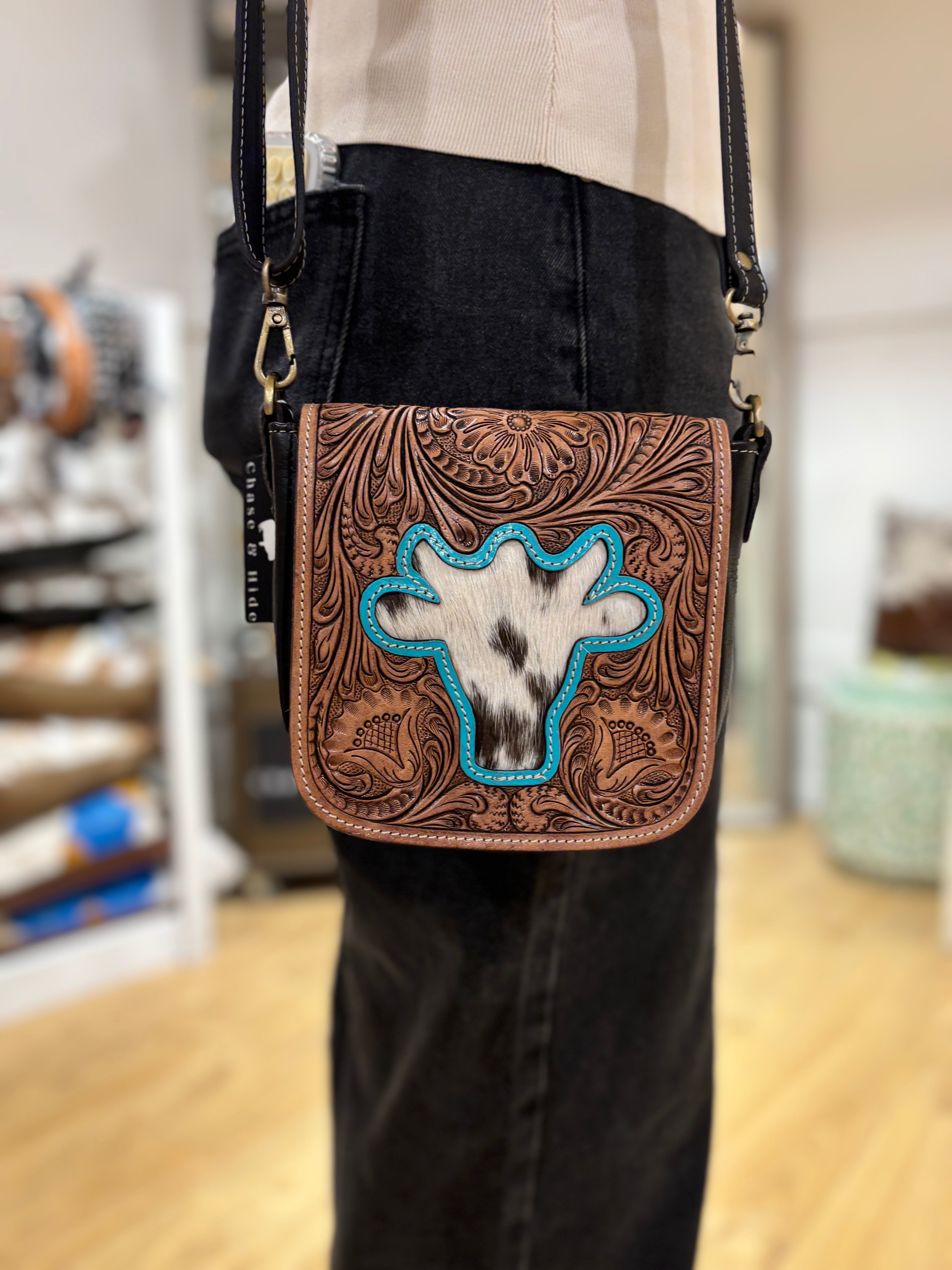 Bullhead tooling leather sling bag