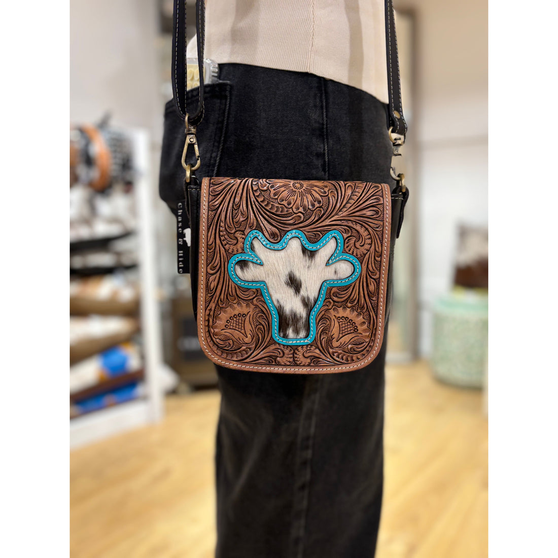 Bullhead tooling leather sling bag