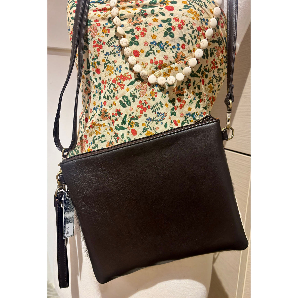Cowhide clutch bag