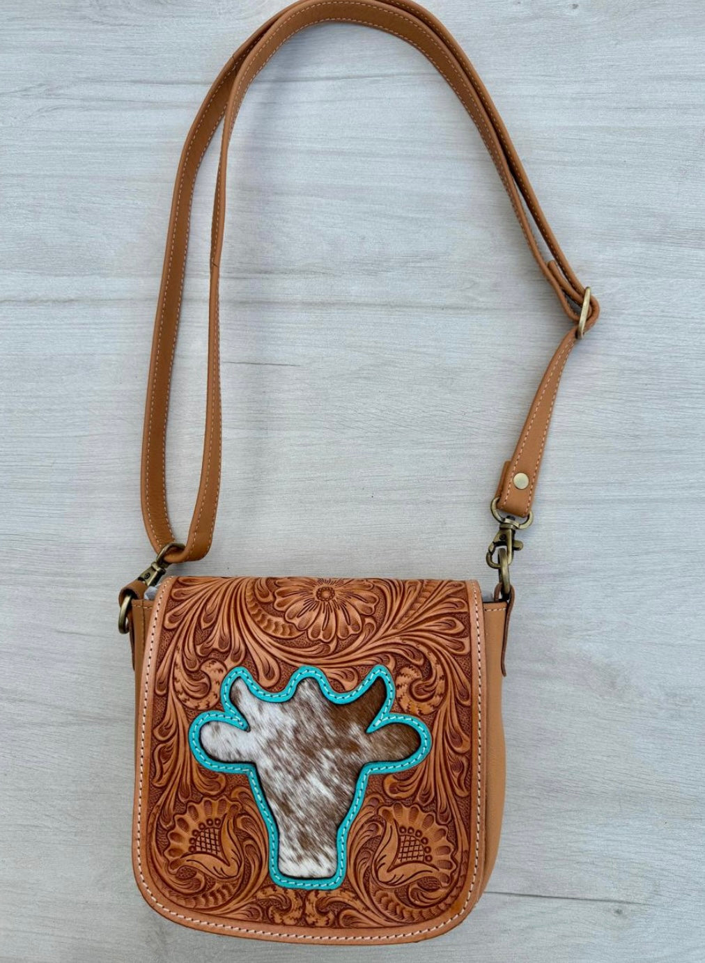 Bullhead tooling leather sling bag