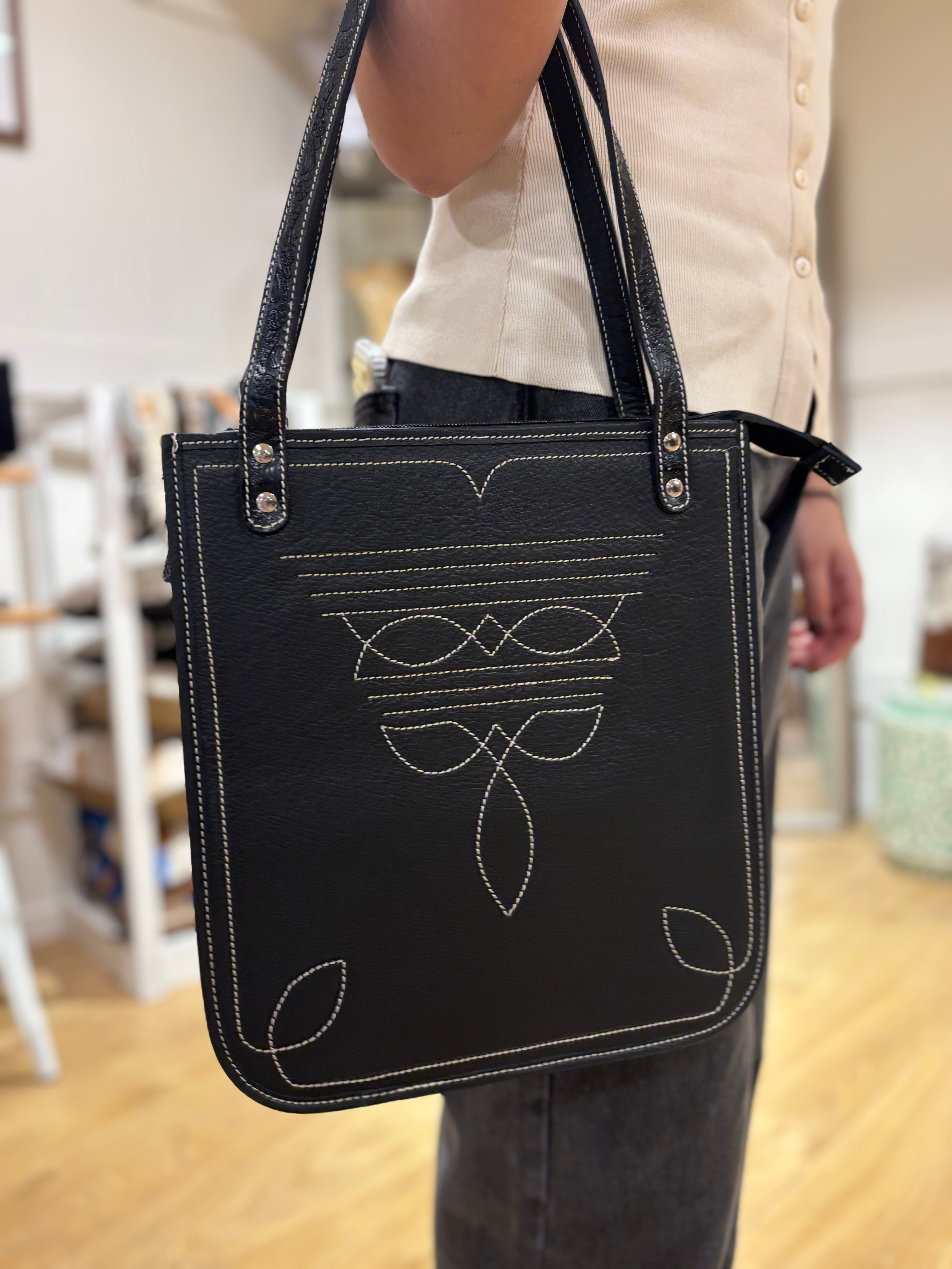 Tooling leather boot stitch bag