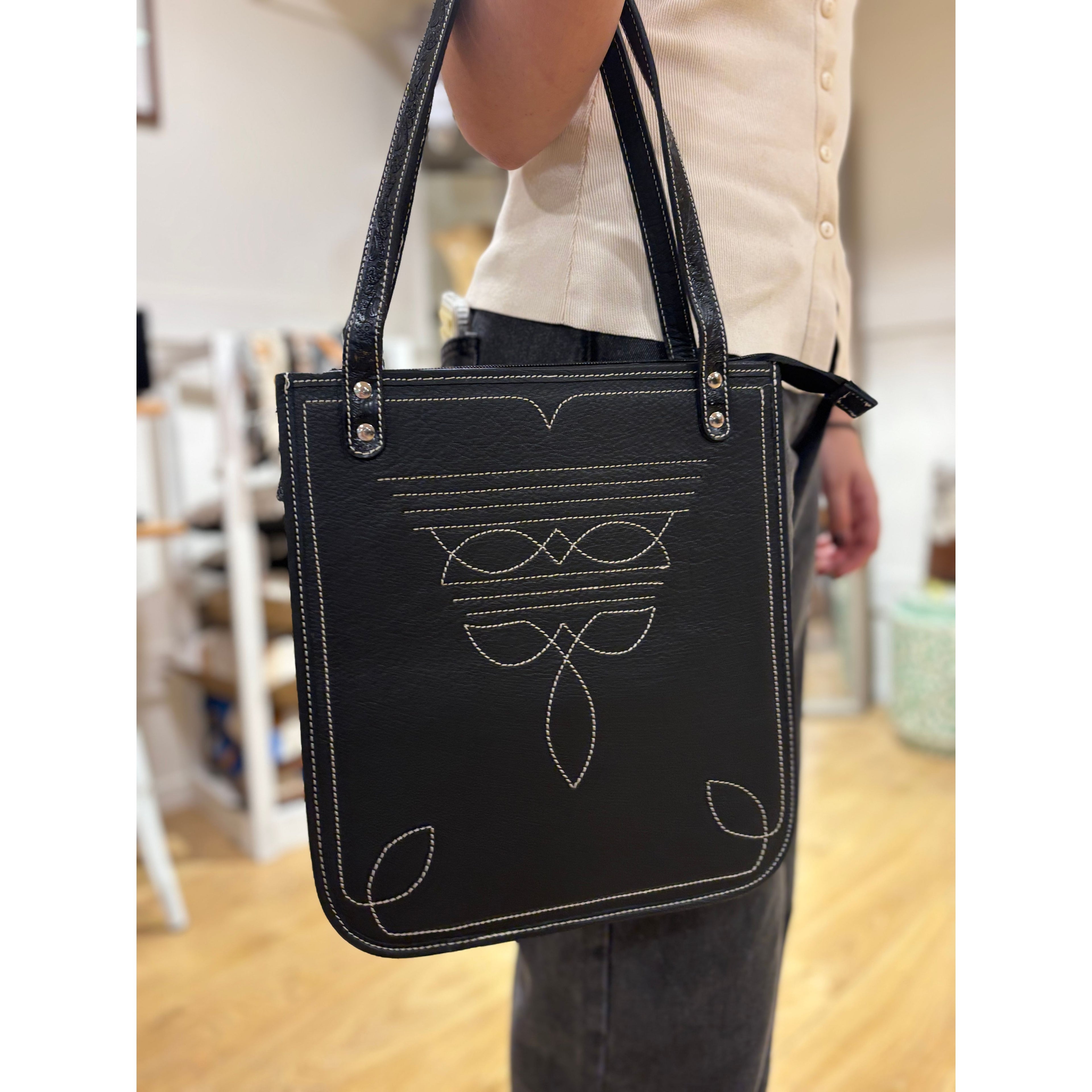 Tooling leather boot stitch bag