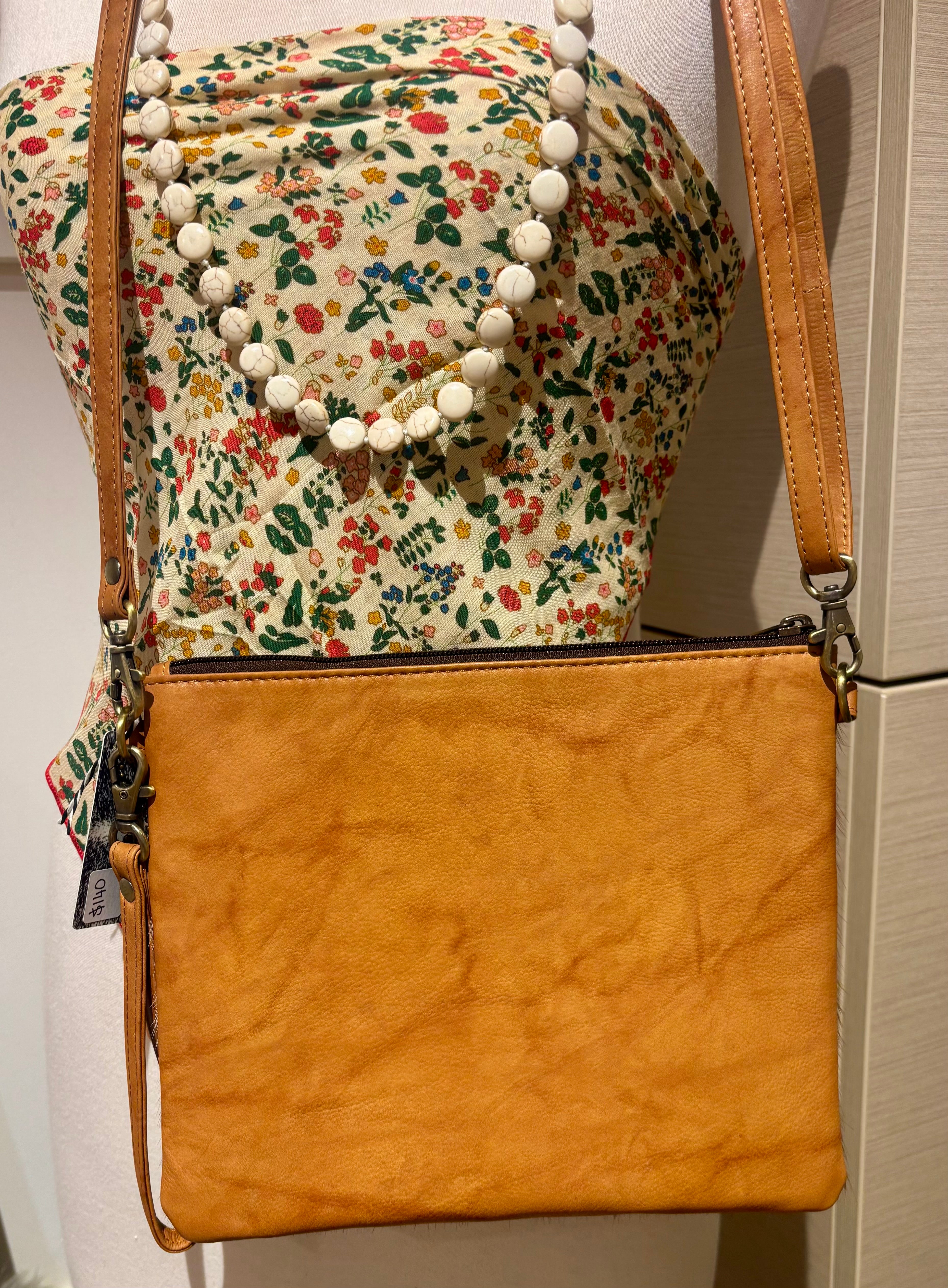 Cowhide clutch bag