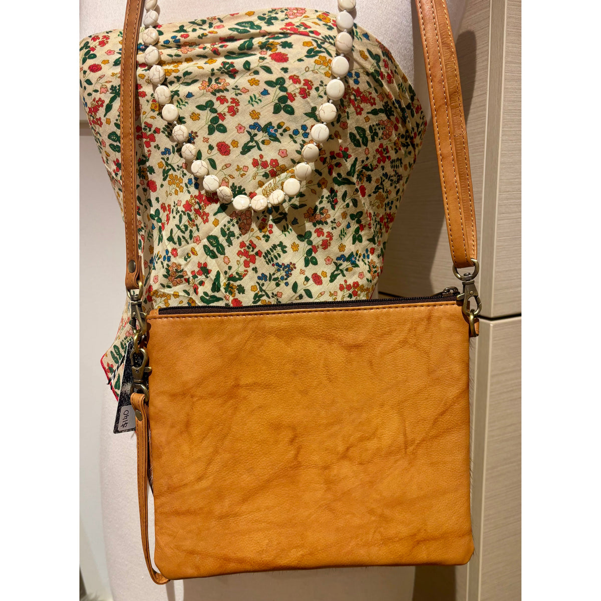 Cowhide clutch bag