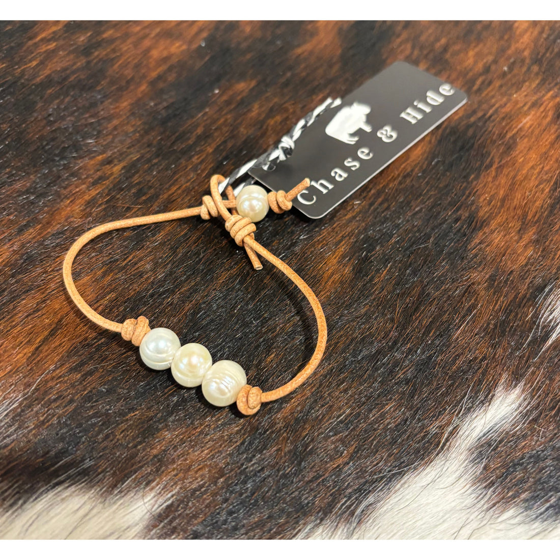 Pearls on light tan leather bracelet