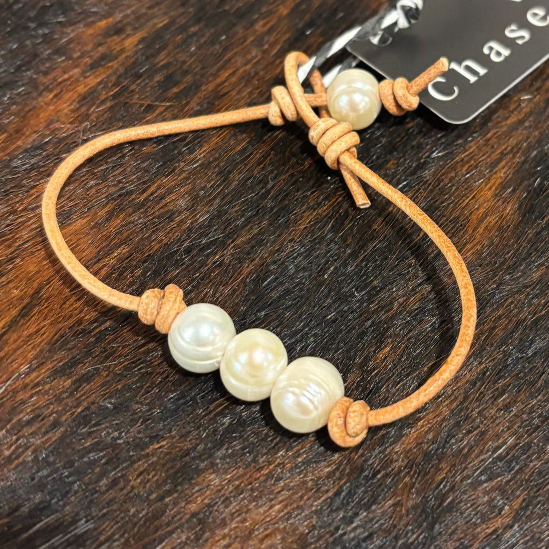 Pearls on light tan leather bracelet