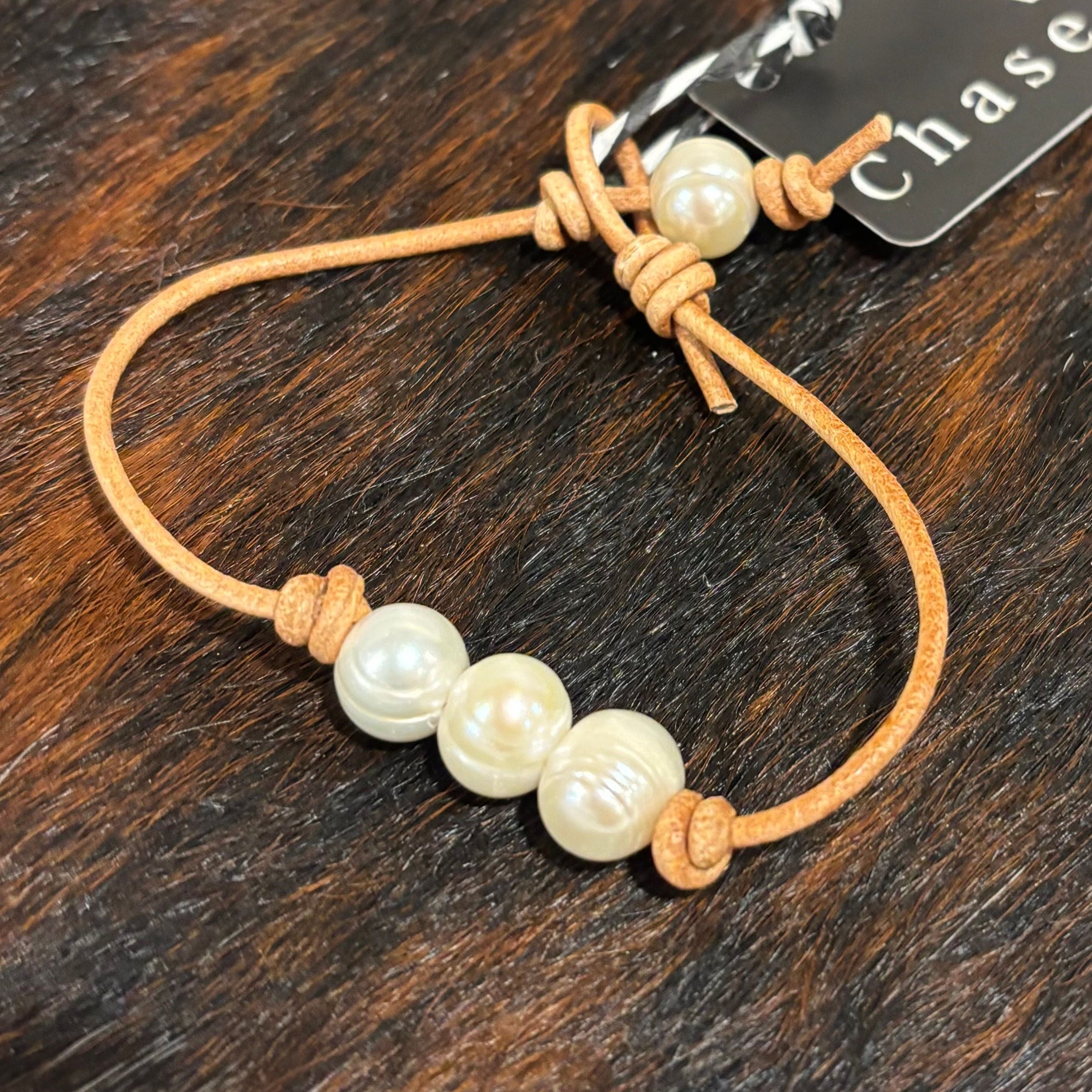 Pearls on light tan leather bracelet