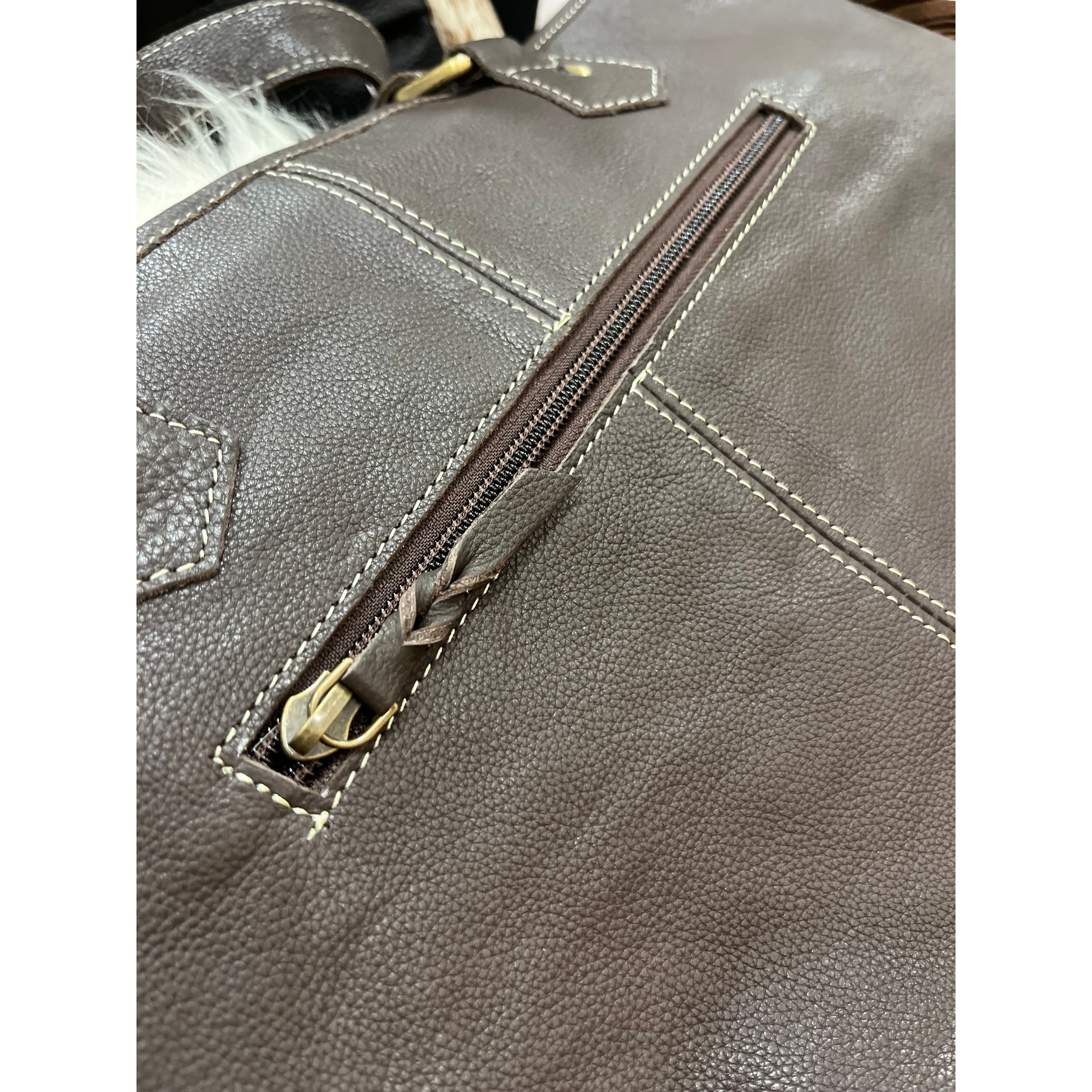 The Yellowstone Handbag with turquoise detail