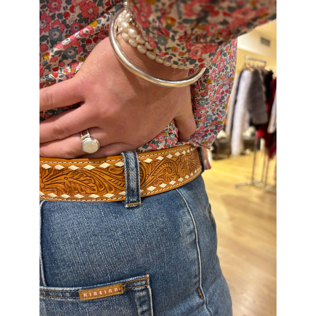 Tan stitched tooling leather belt