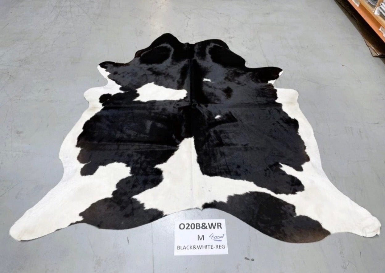 ON HOLD Cow Hide Rug