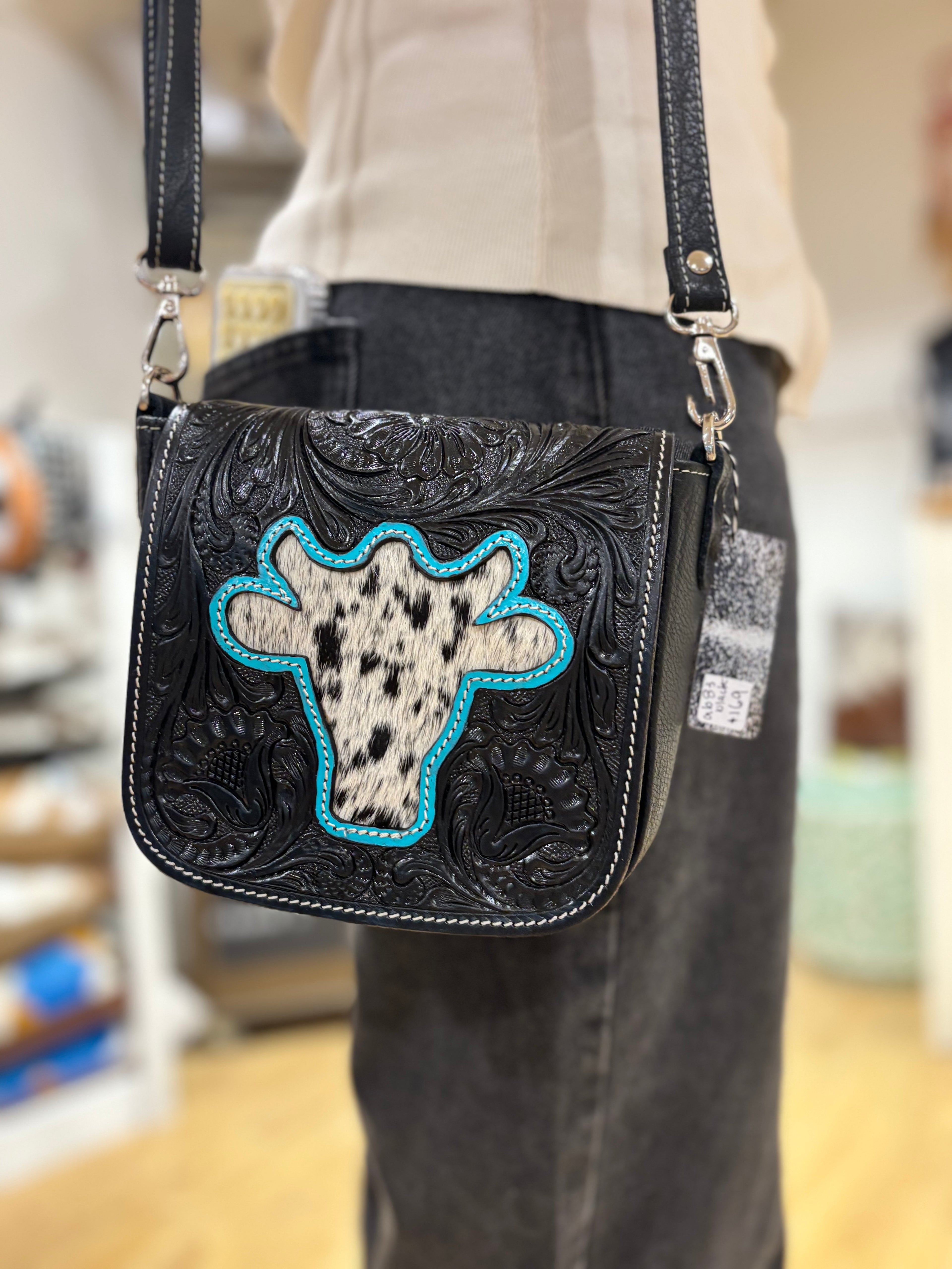 Bullhead tooling leather sling bag