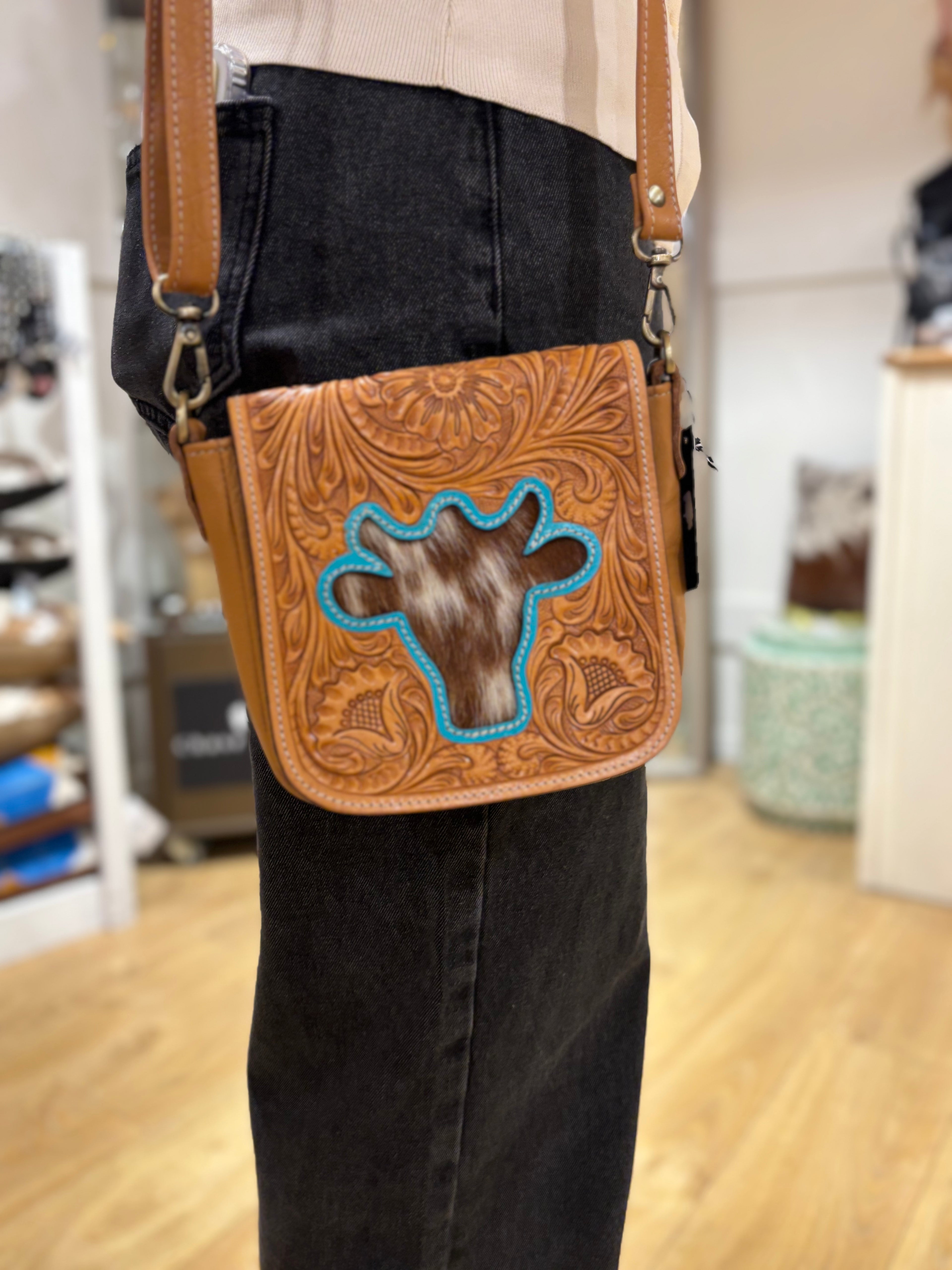 Bullhead tooling leather sling bag