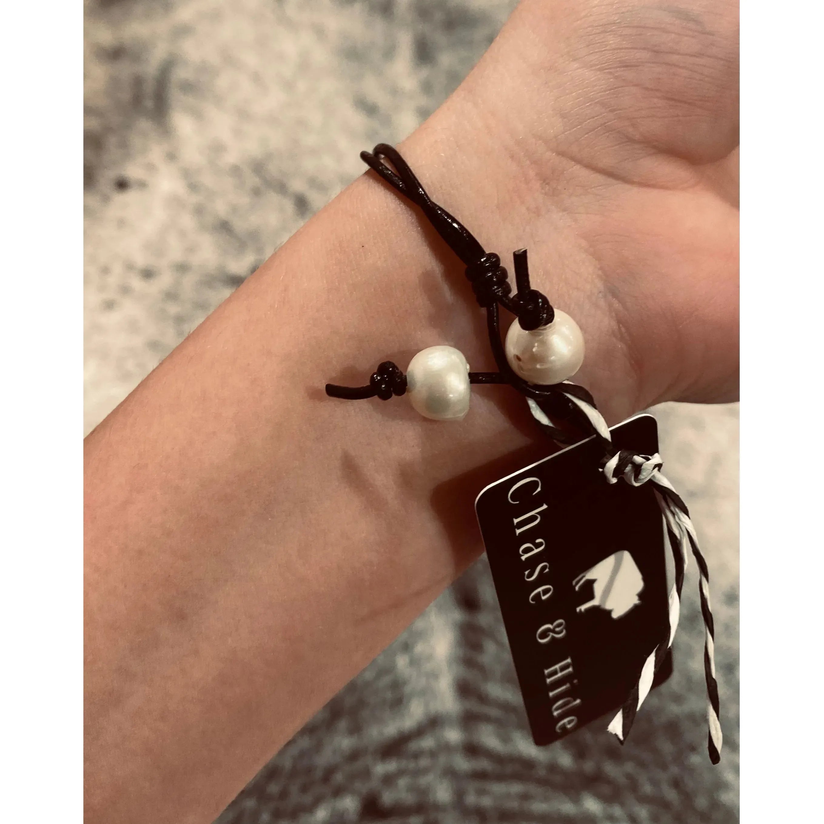 Black leather and pearl bracelet