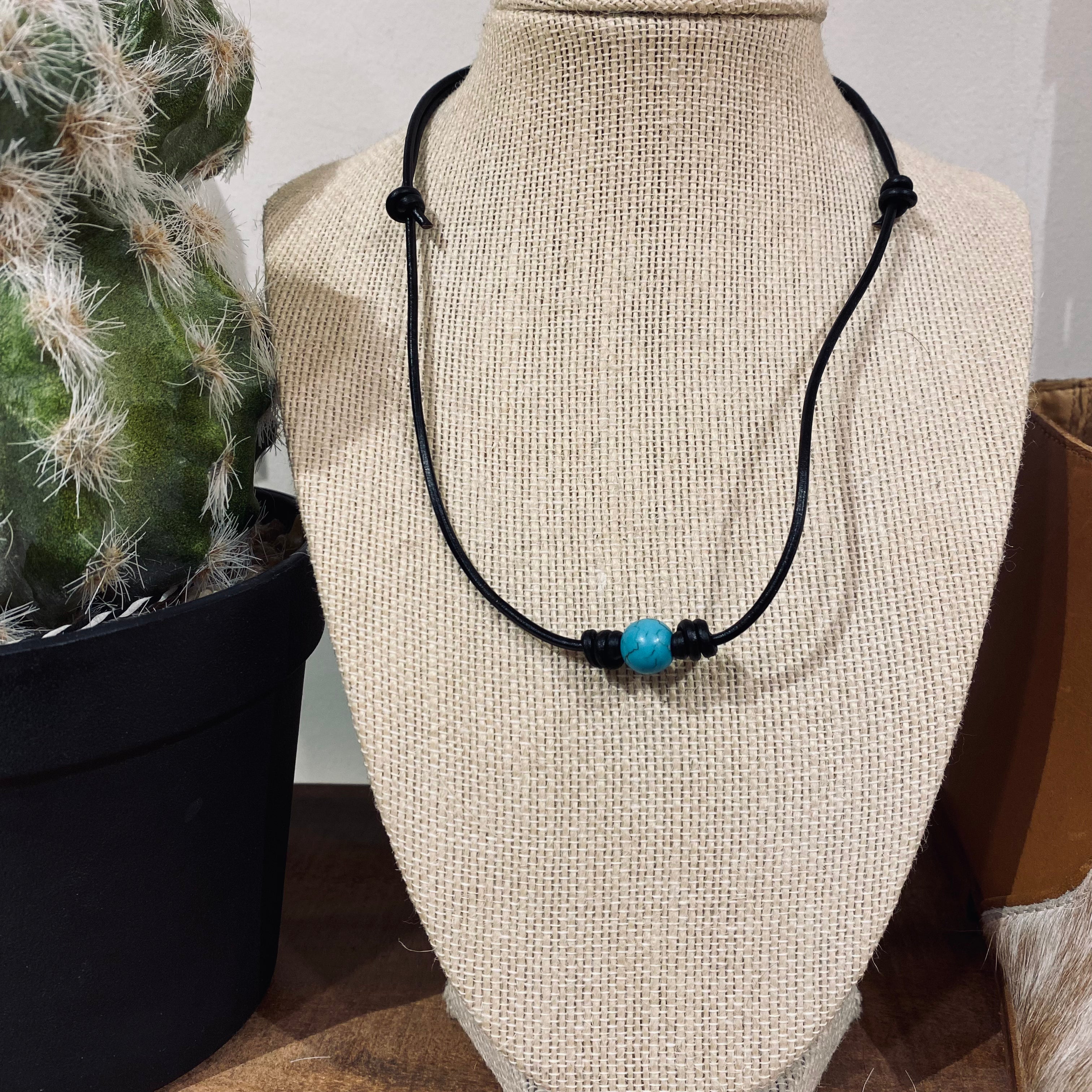 Single Turquoise Bead on Black Leather Choker