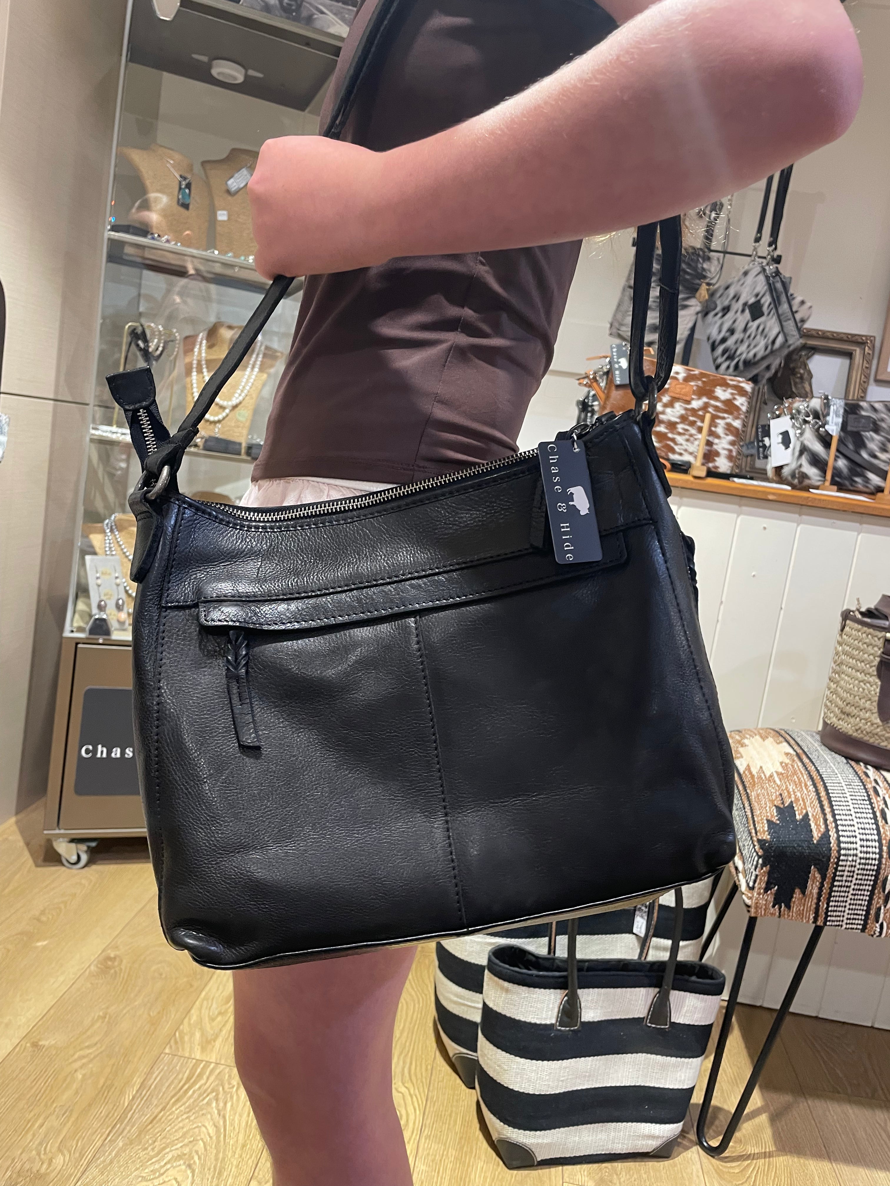 Black leather crossbody with flap detail