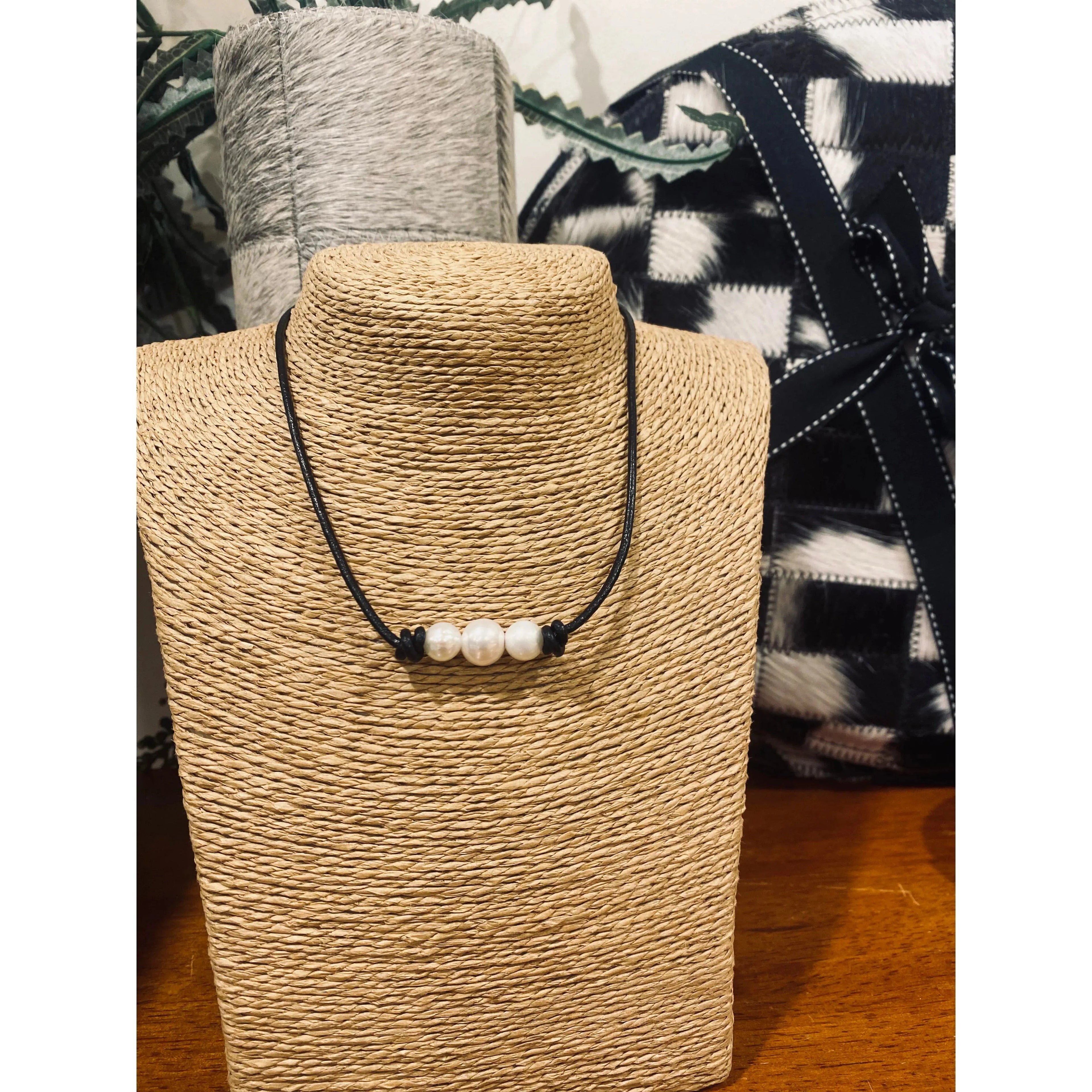 Pearls on black leather choker / necklace