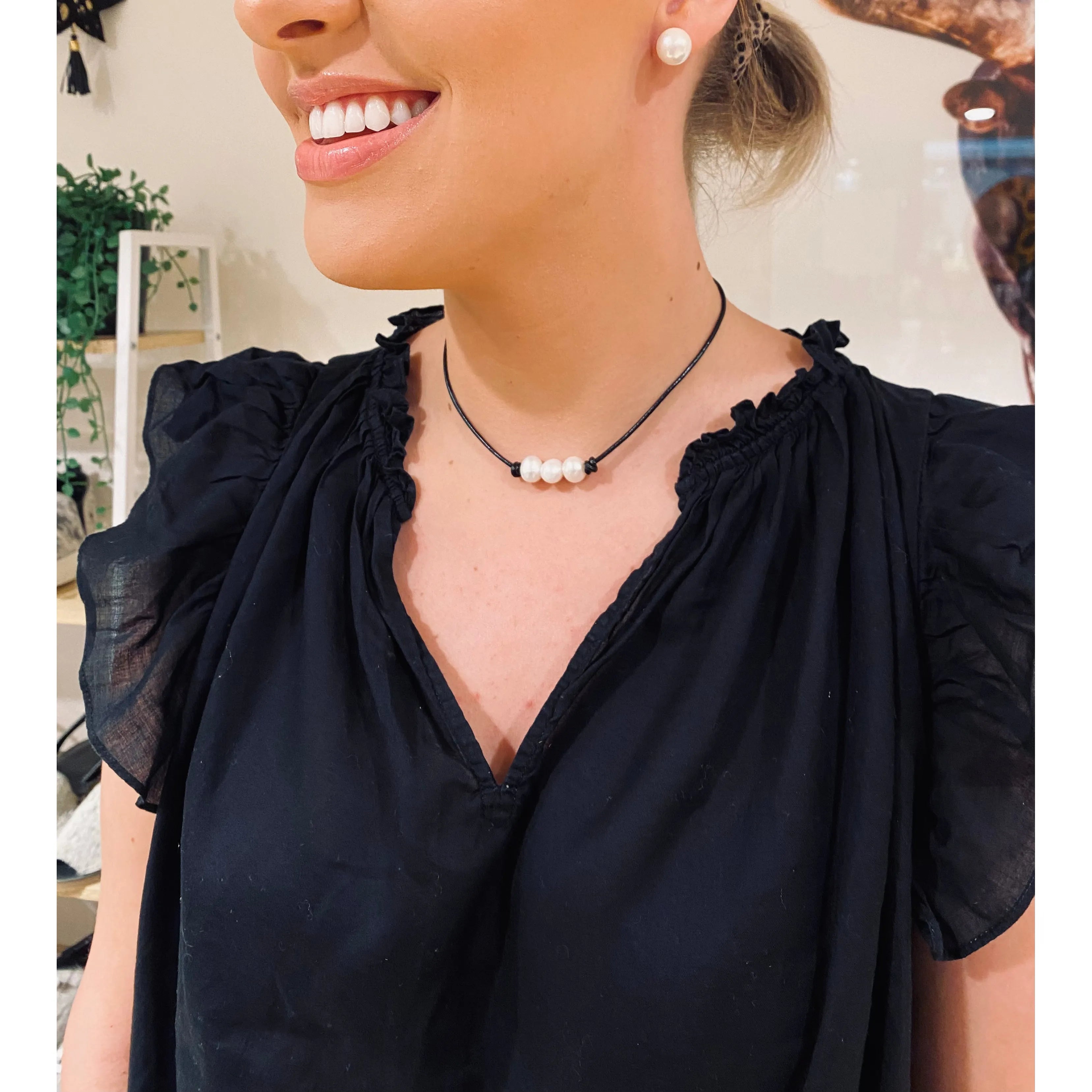Pearls on black leather choker / necklace