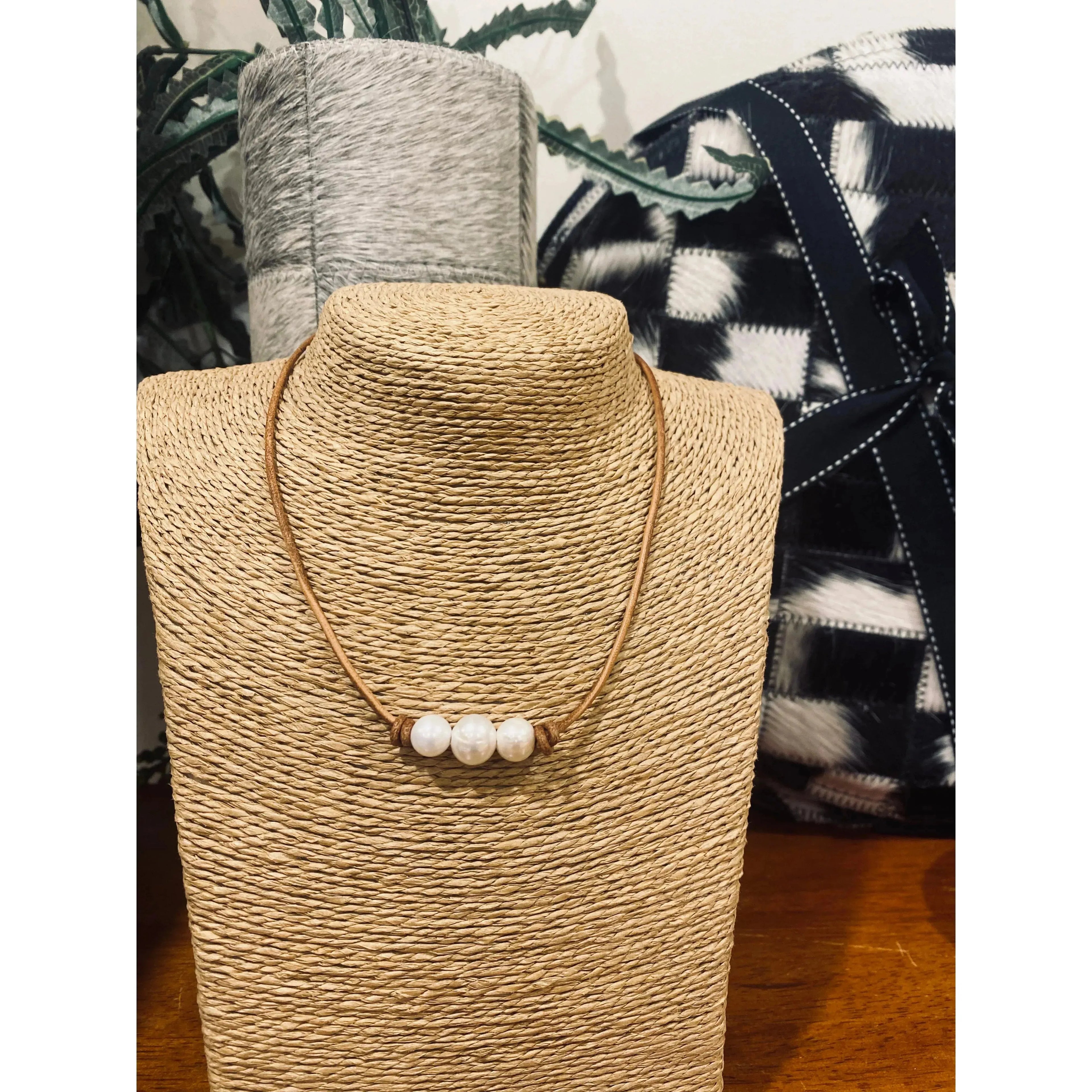Pearls on light leather choker / necklace