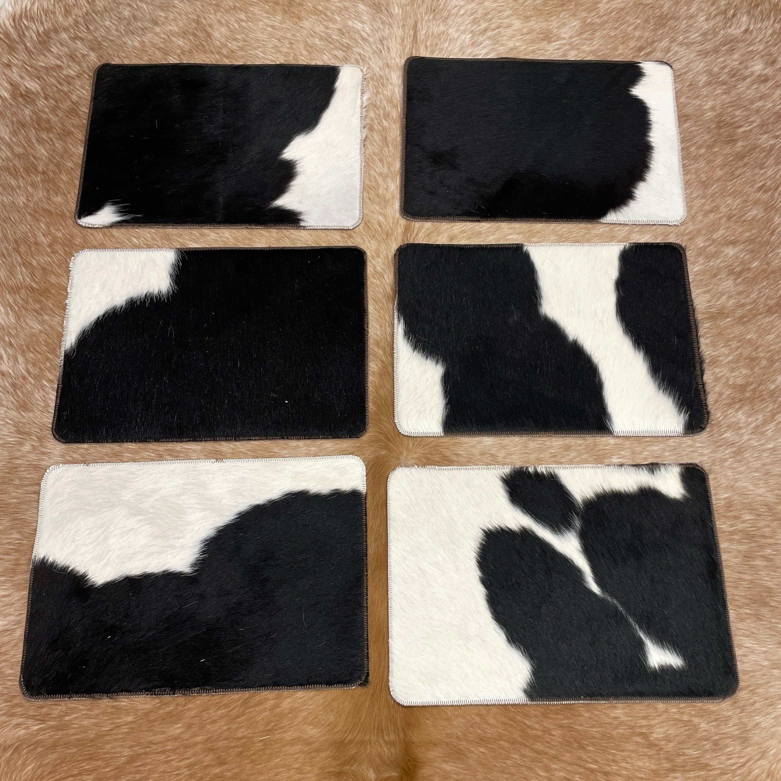 Plain cowhide placemats ( set of six)