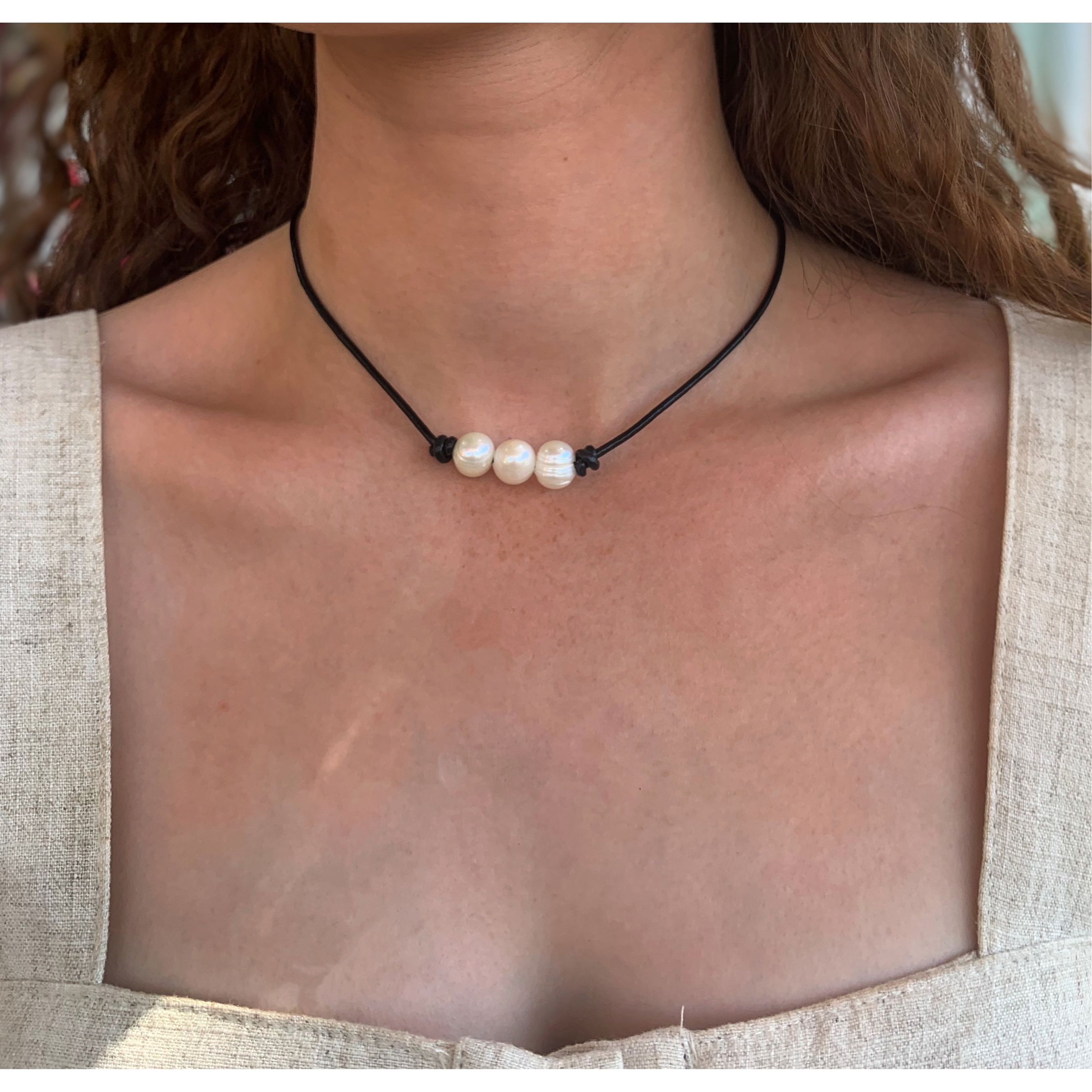 Pearls on black leather choker / necklace