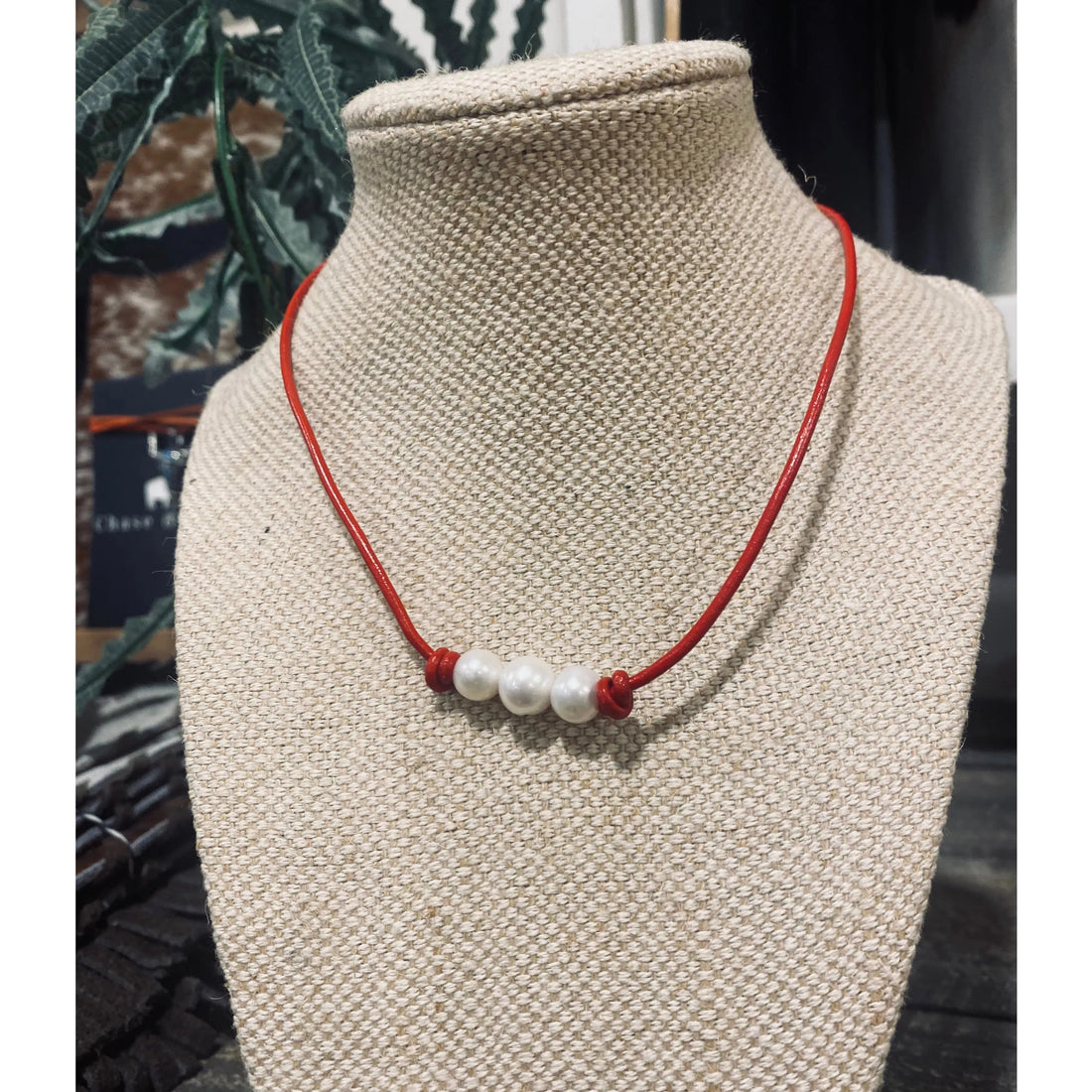 Pearls on Red leather