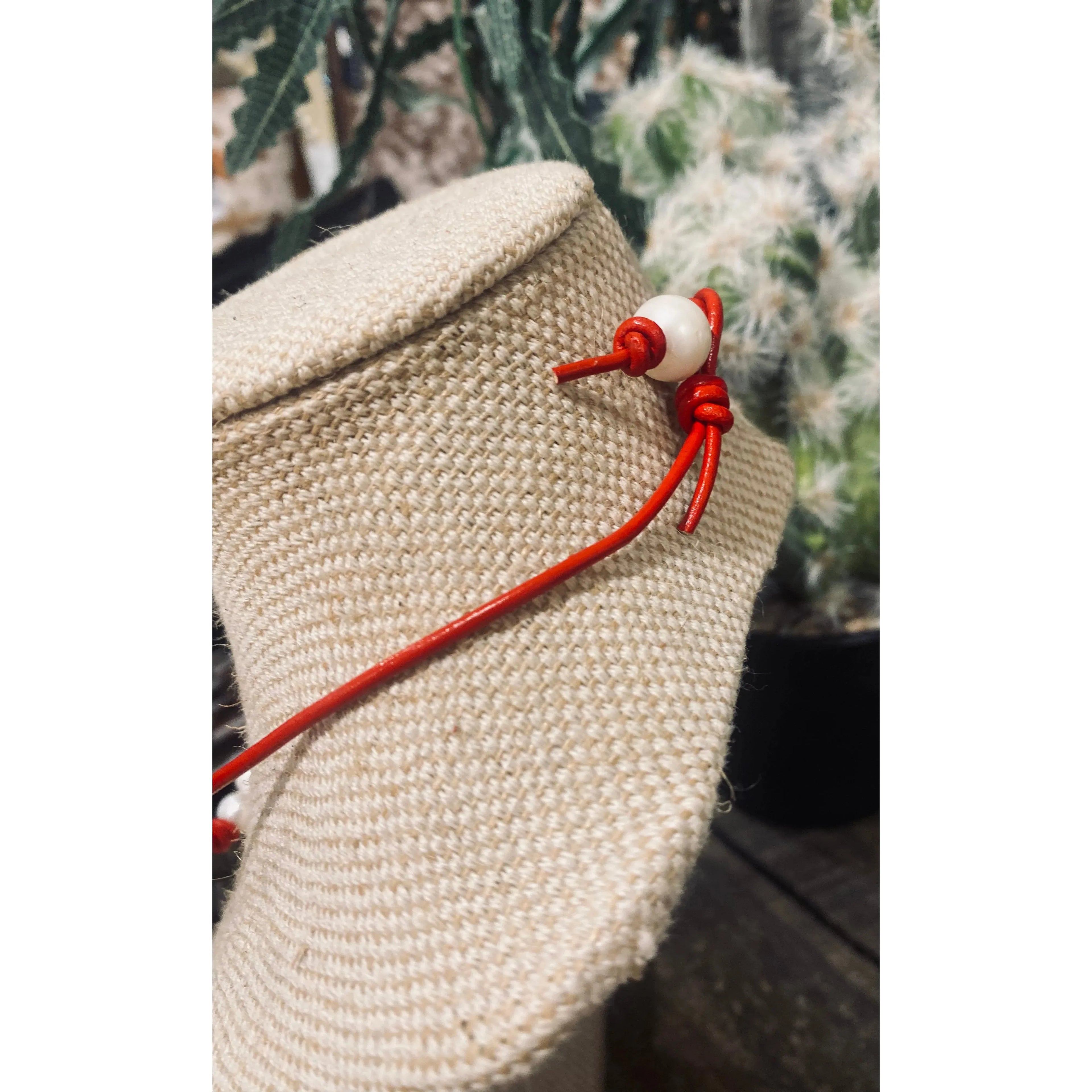 Pearls on Red leather