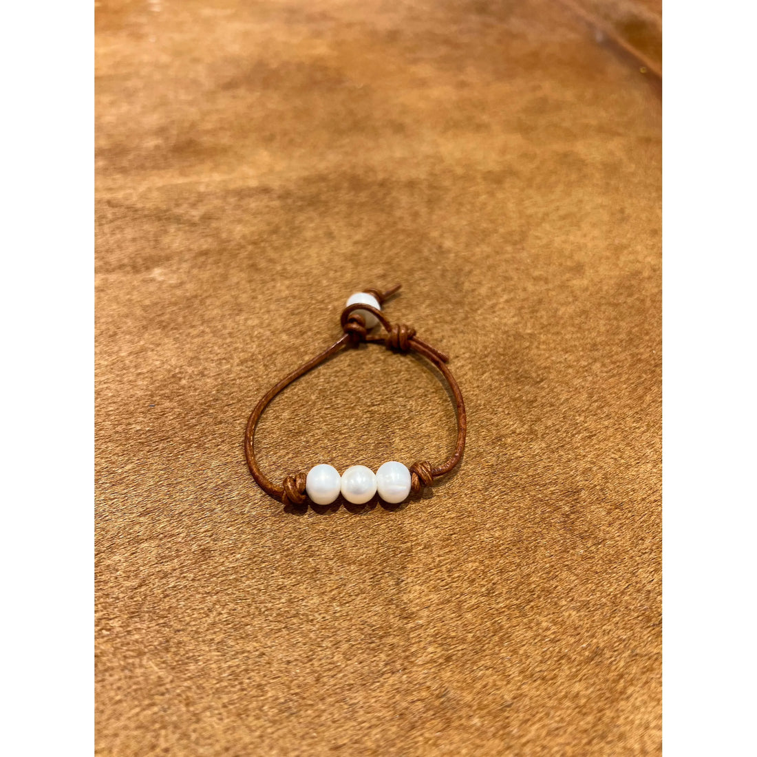 Pearls on tan leather bracelet