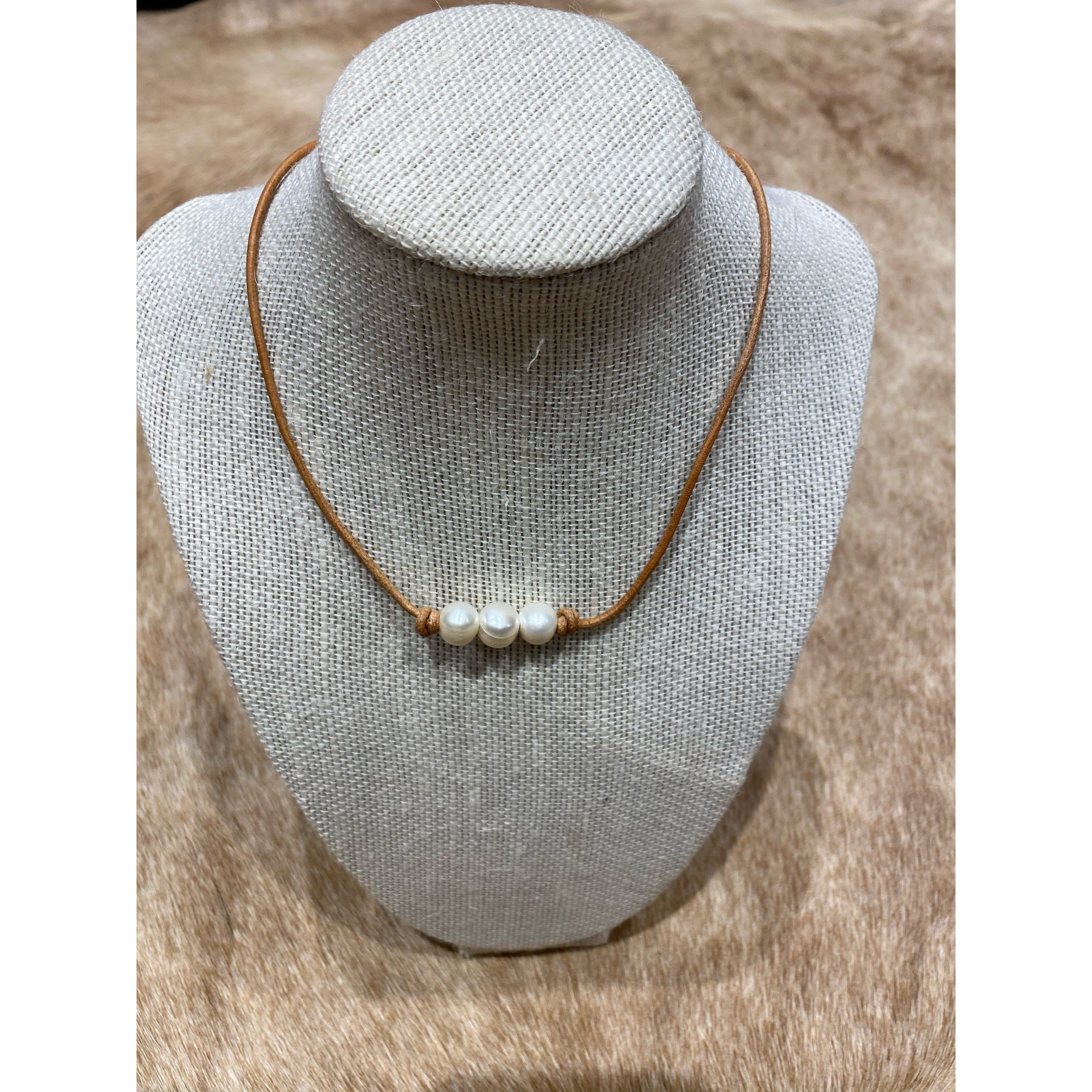 Pearls on light leather choker / necklace