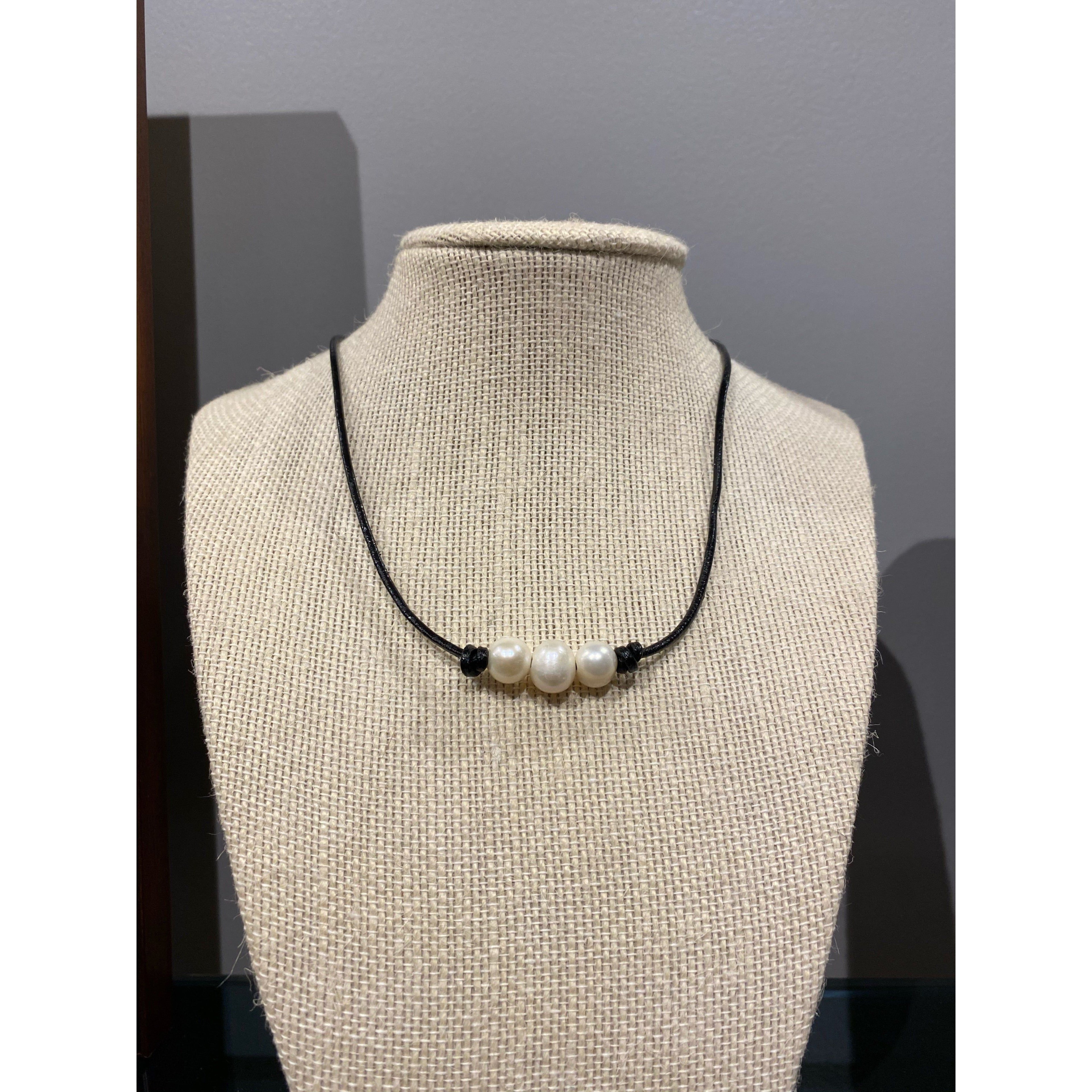 Pearls on black leather choker / necklace