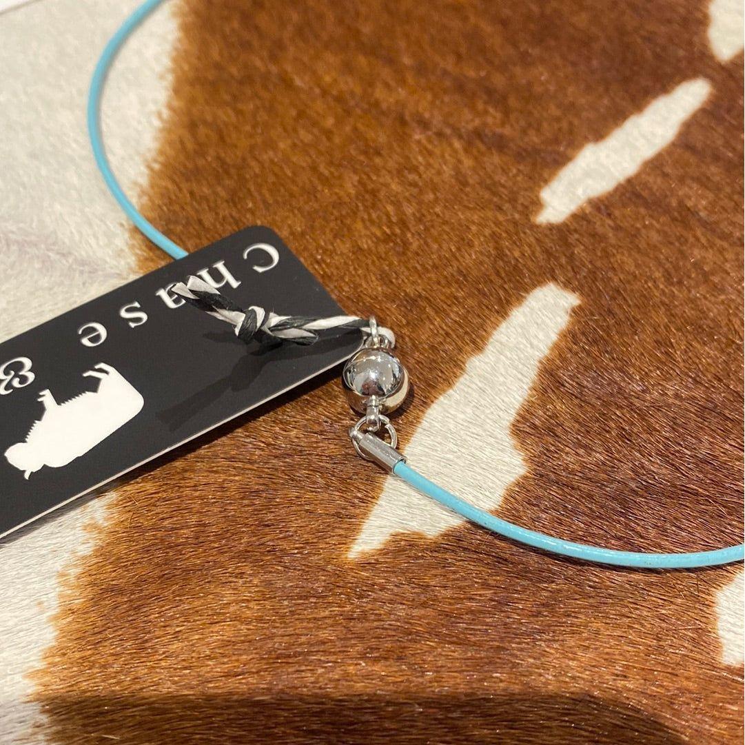 Fresh water pearls on blue cord