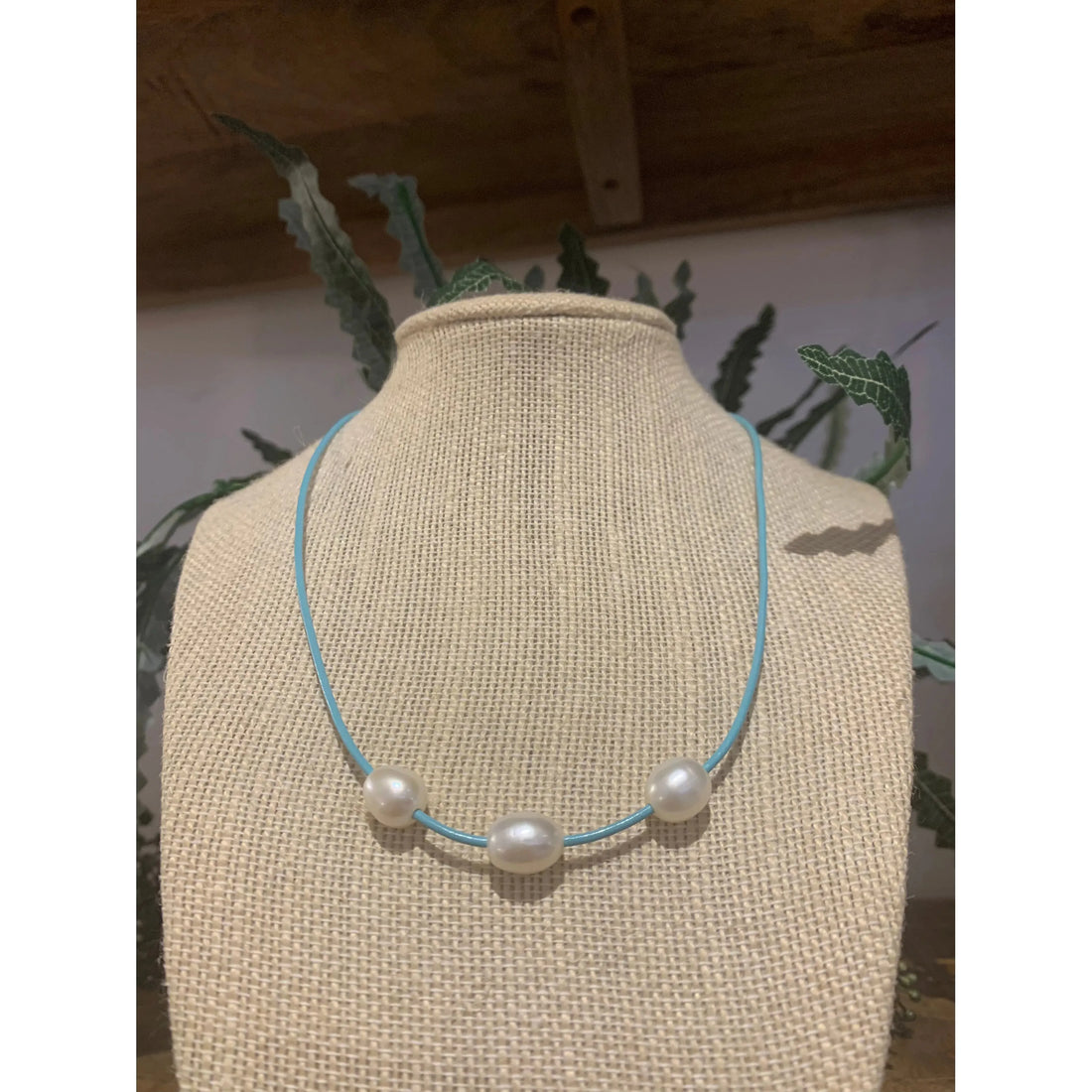 Fresh water pearls on blue cord