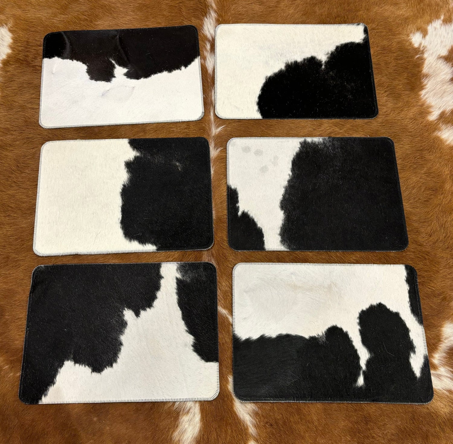 Plain cowhide placemats ( set of six) 