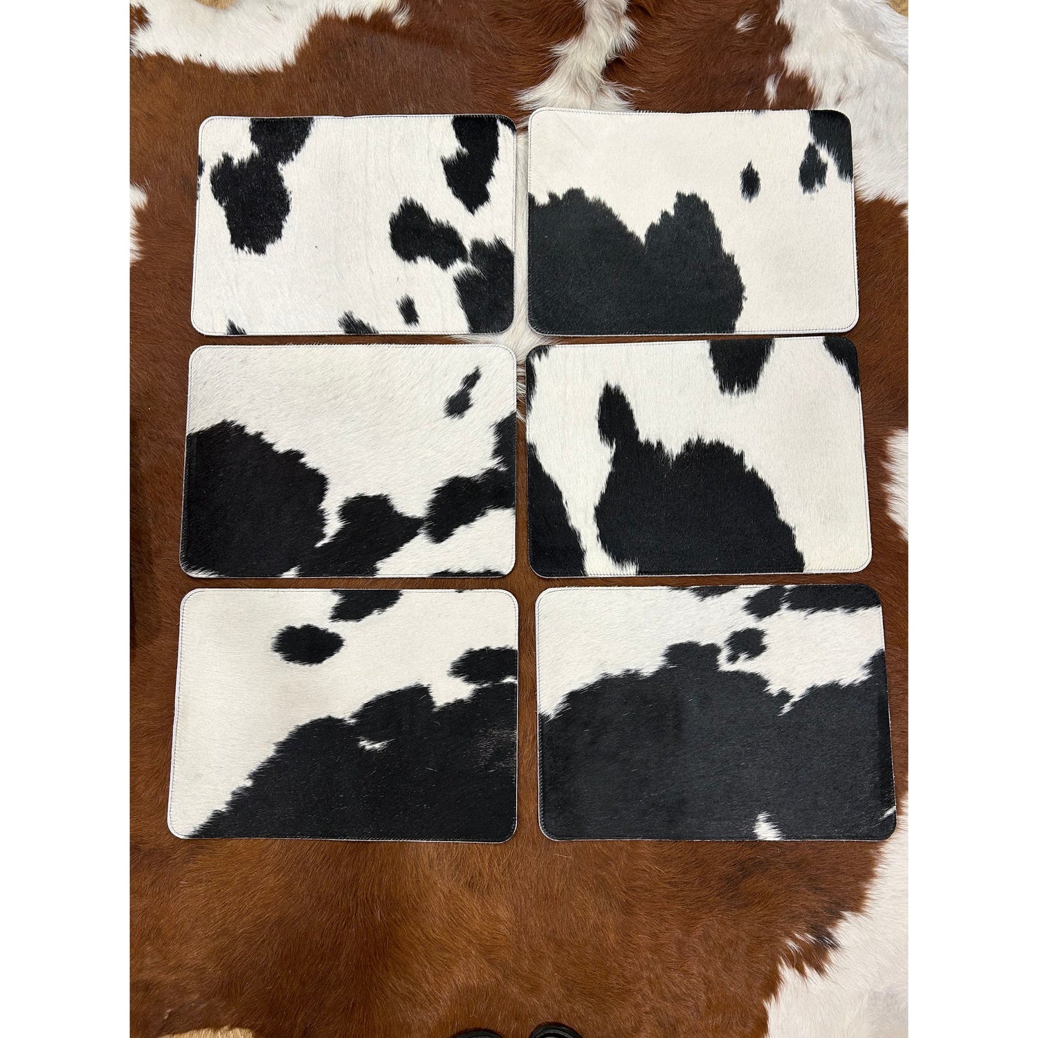 Plain cowhide placemats ( set of six) 