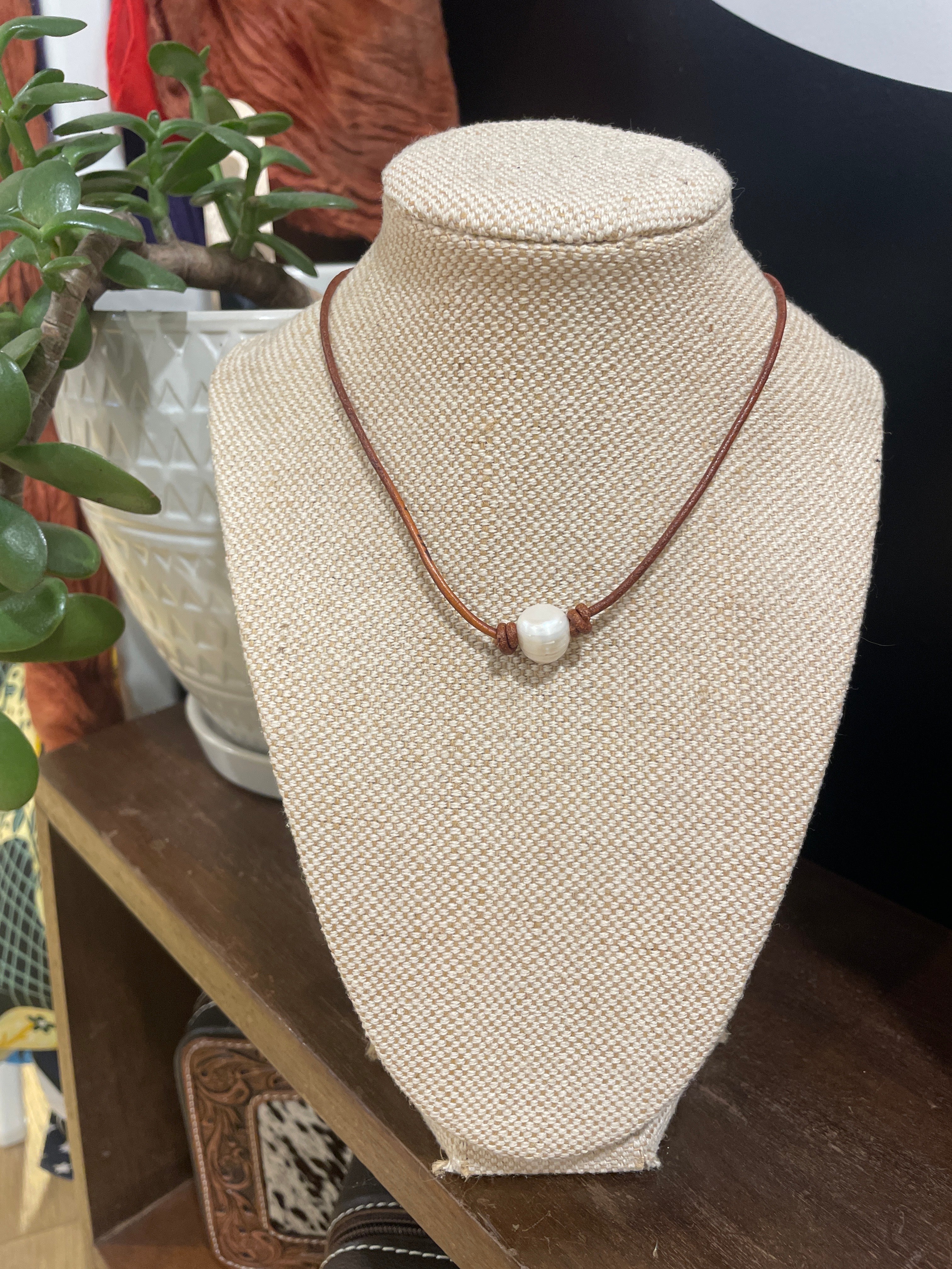 Single Pearl on dark tan leather necklace 
