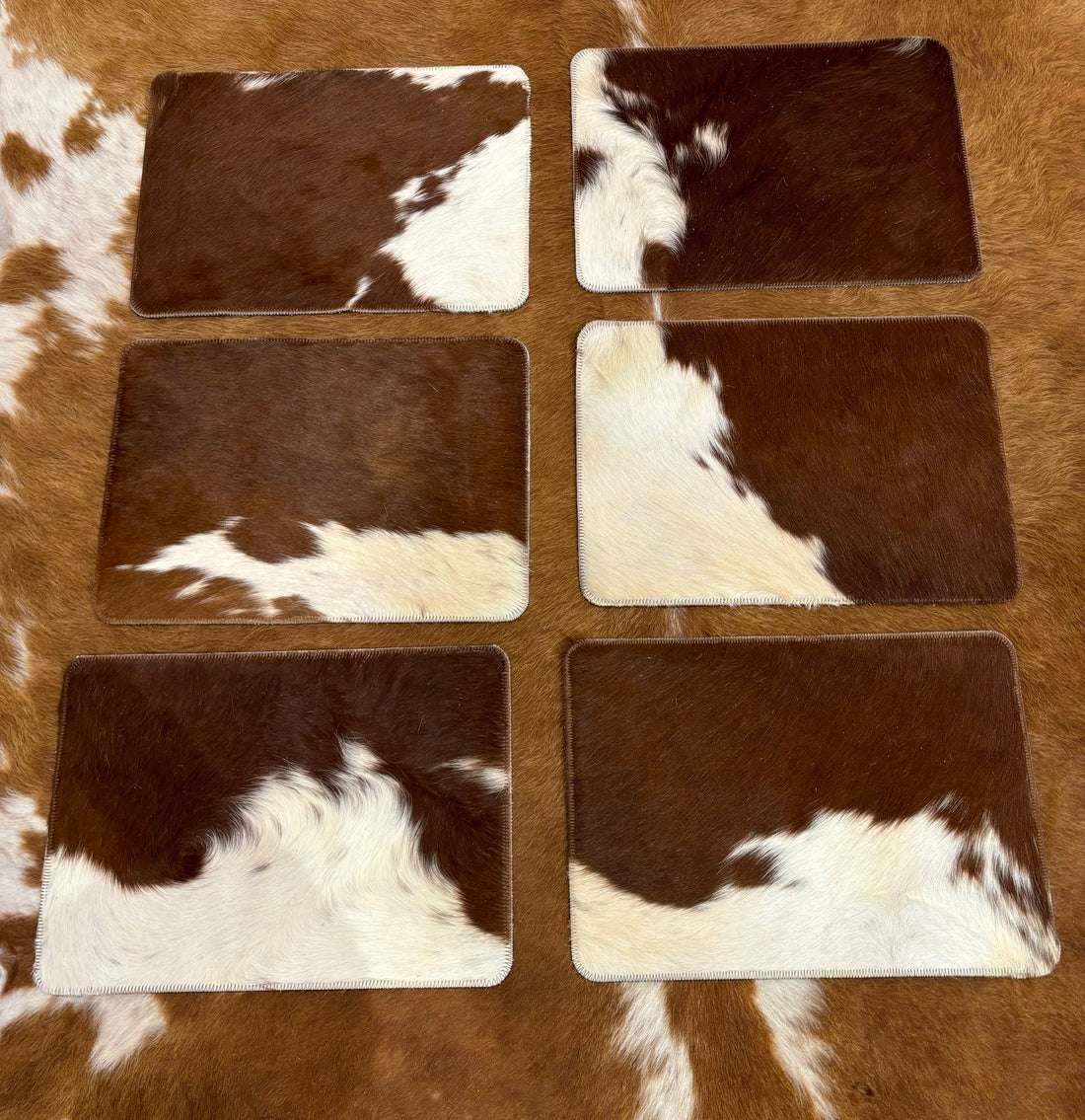 ON HOLD Plain cowhide placemats ( set of six) 