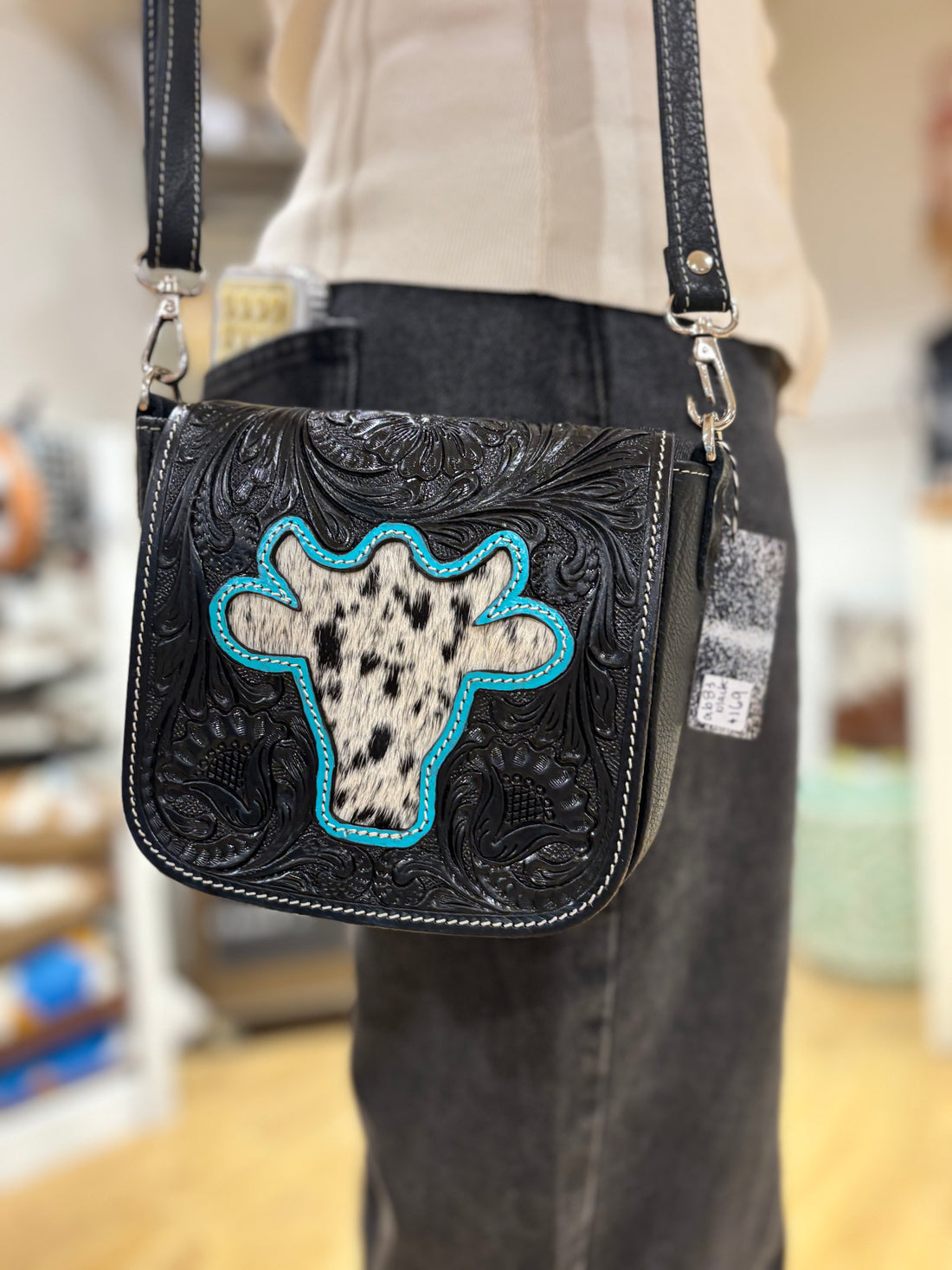 Bullhead tooling leather sling bag