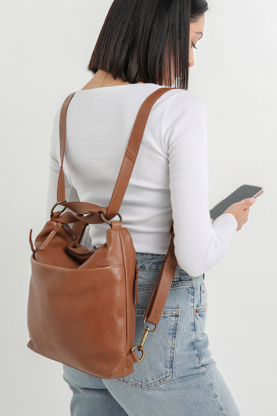 Tan leather backpack/shoulder/crossbody bag