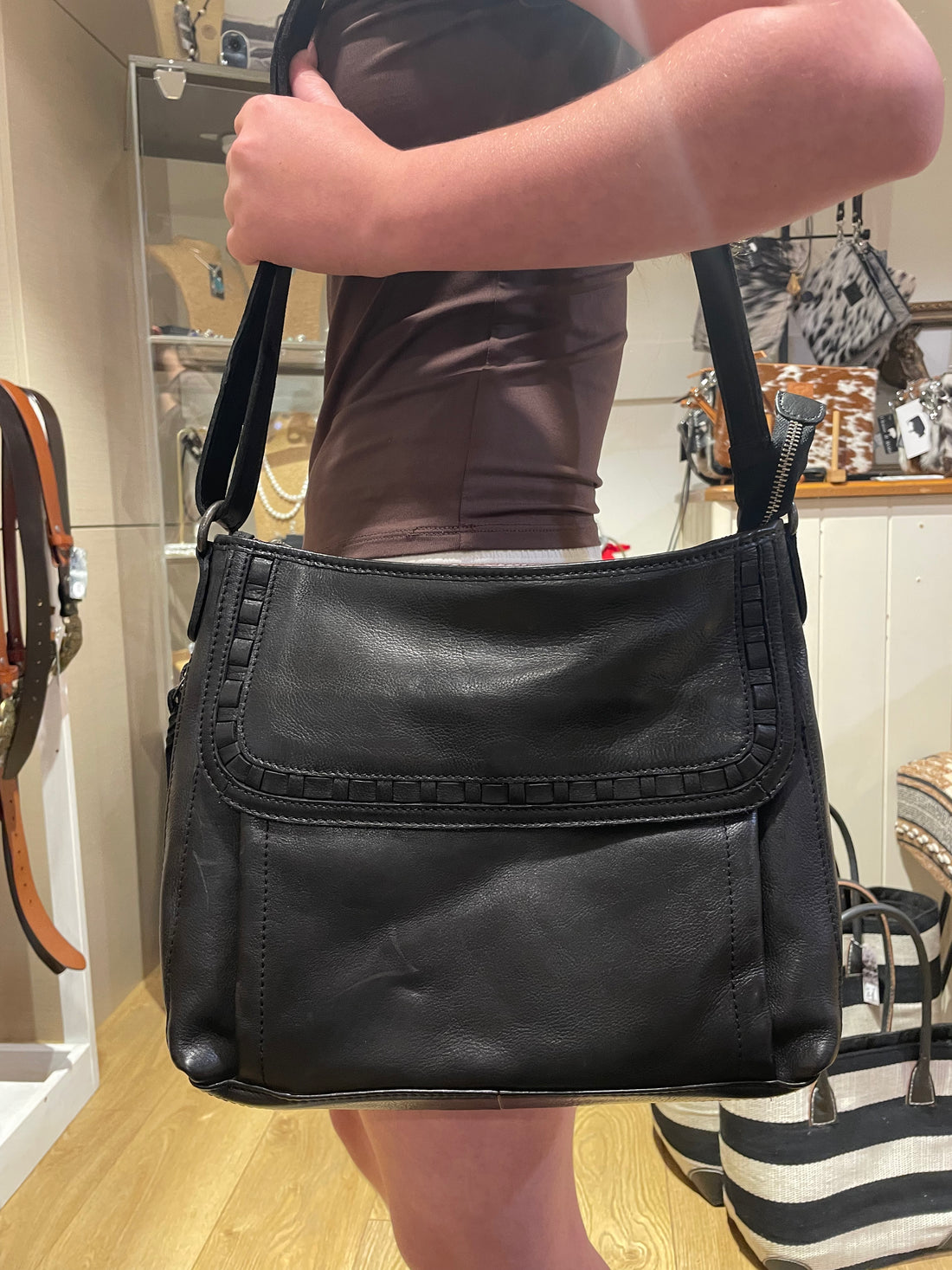 Black leather crossbody with flap detail
