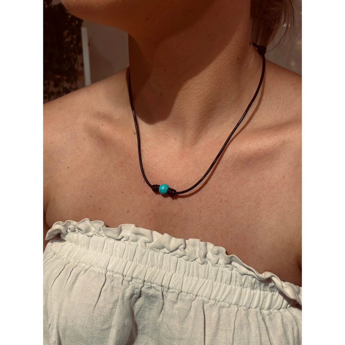 Single Turquoise Bead on Black Leather Choker