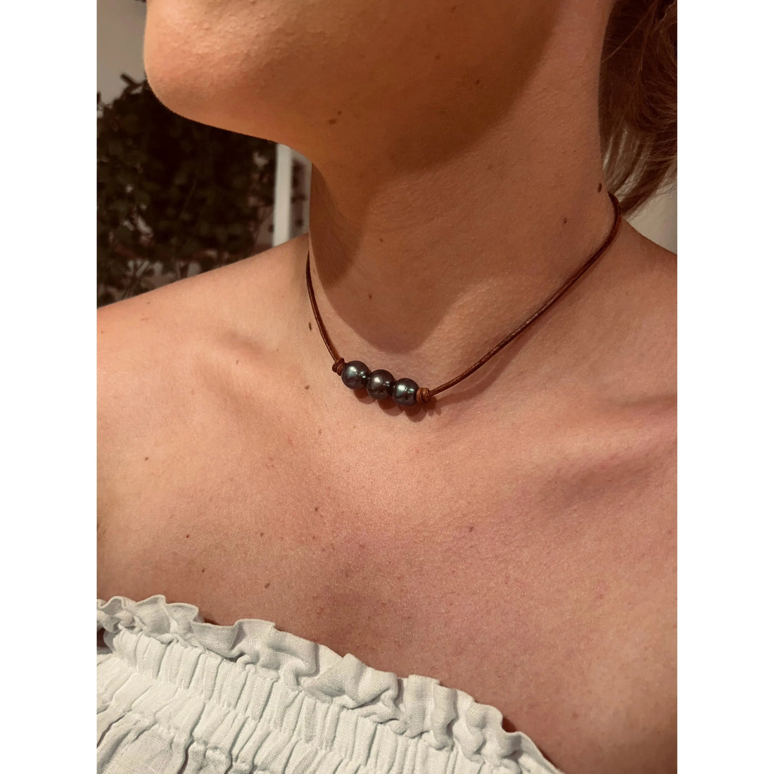 Dark Pearls on light leather choker / necklace