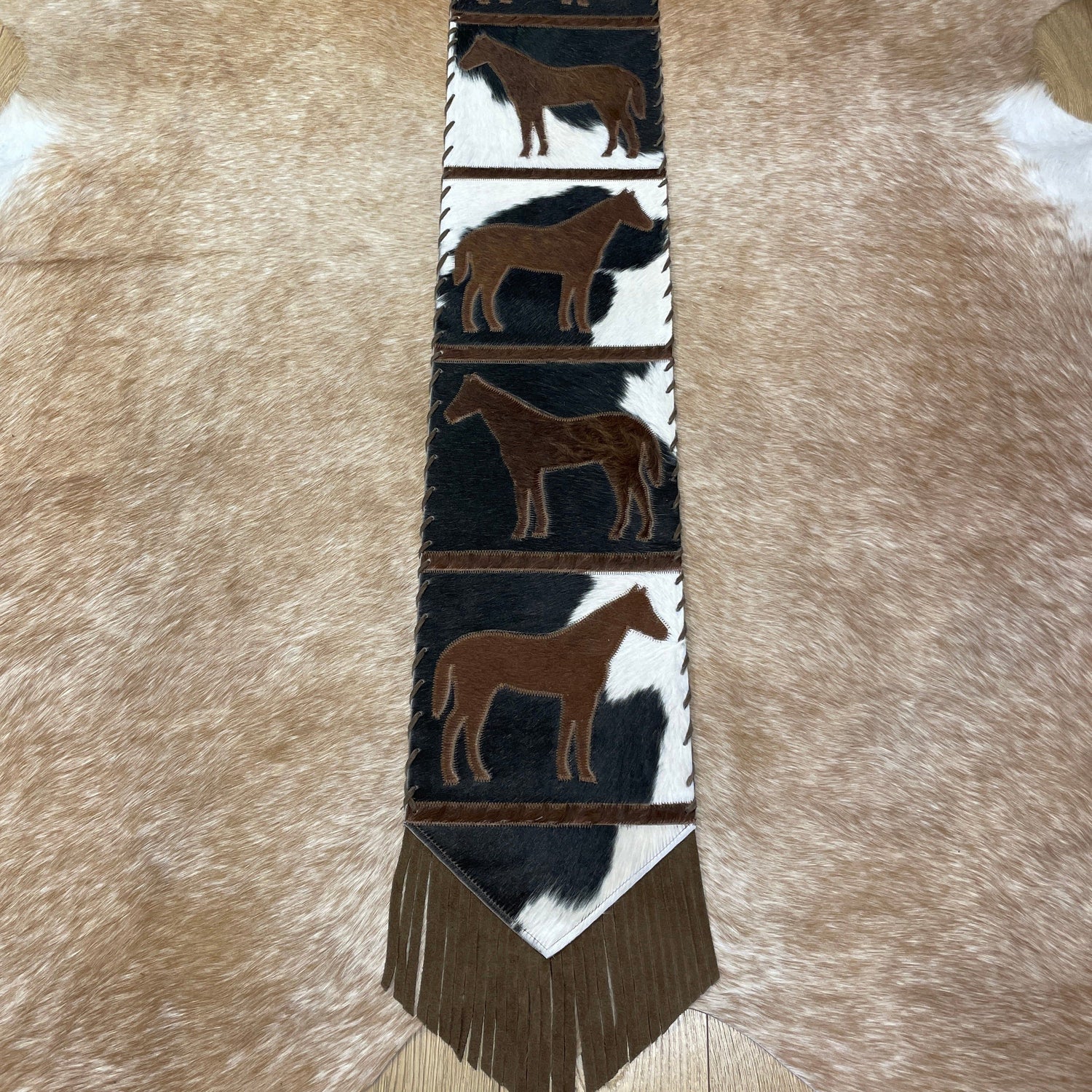 Cowhide table runner with tassels 