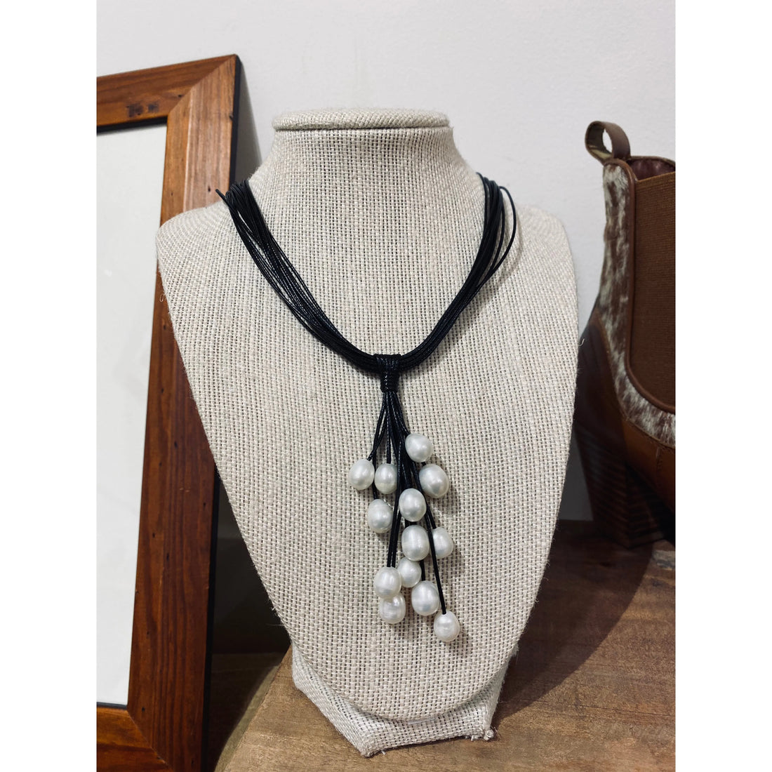 Freshwater pearl and 13 layer necklace on black leather 