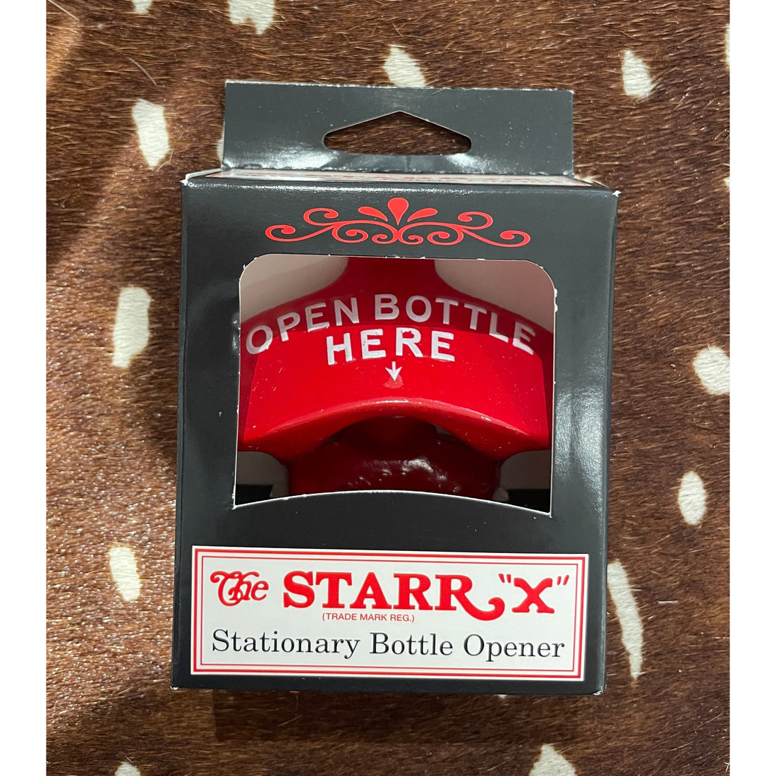 Stationary bottle opener 