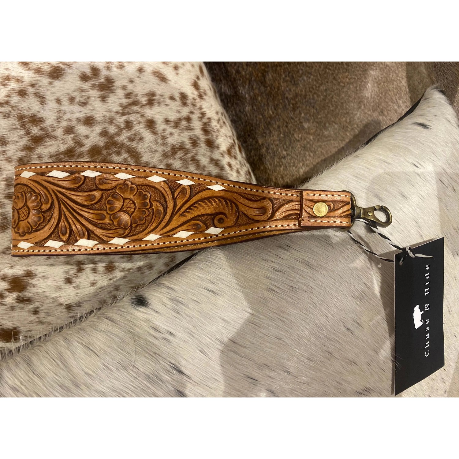 Tooled leather wristlet