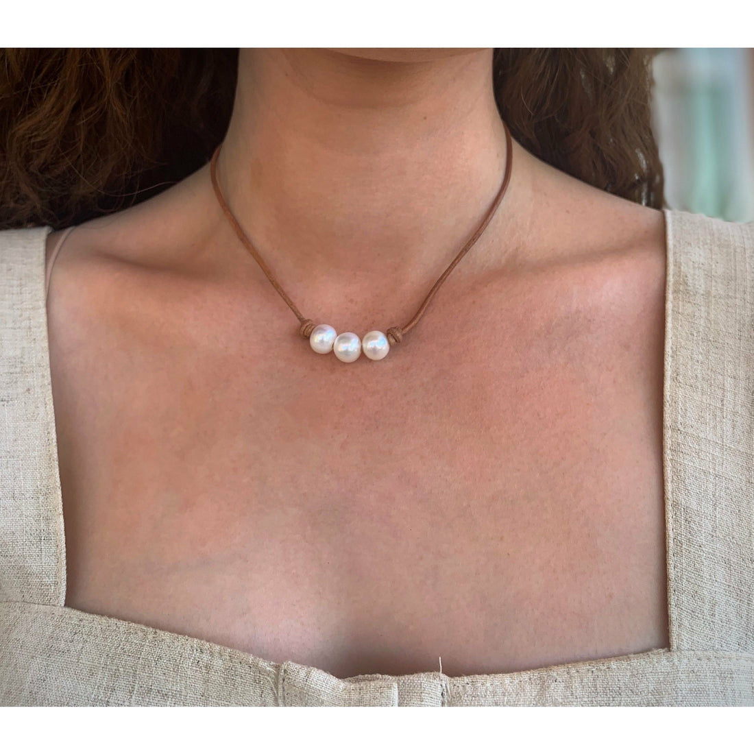 Pearls on light leather choker / necklace