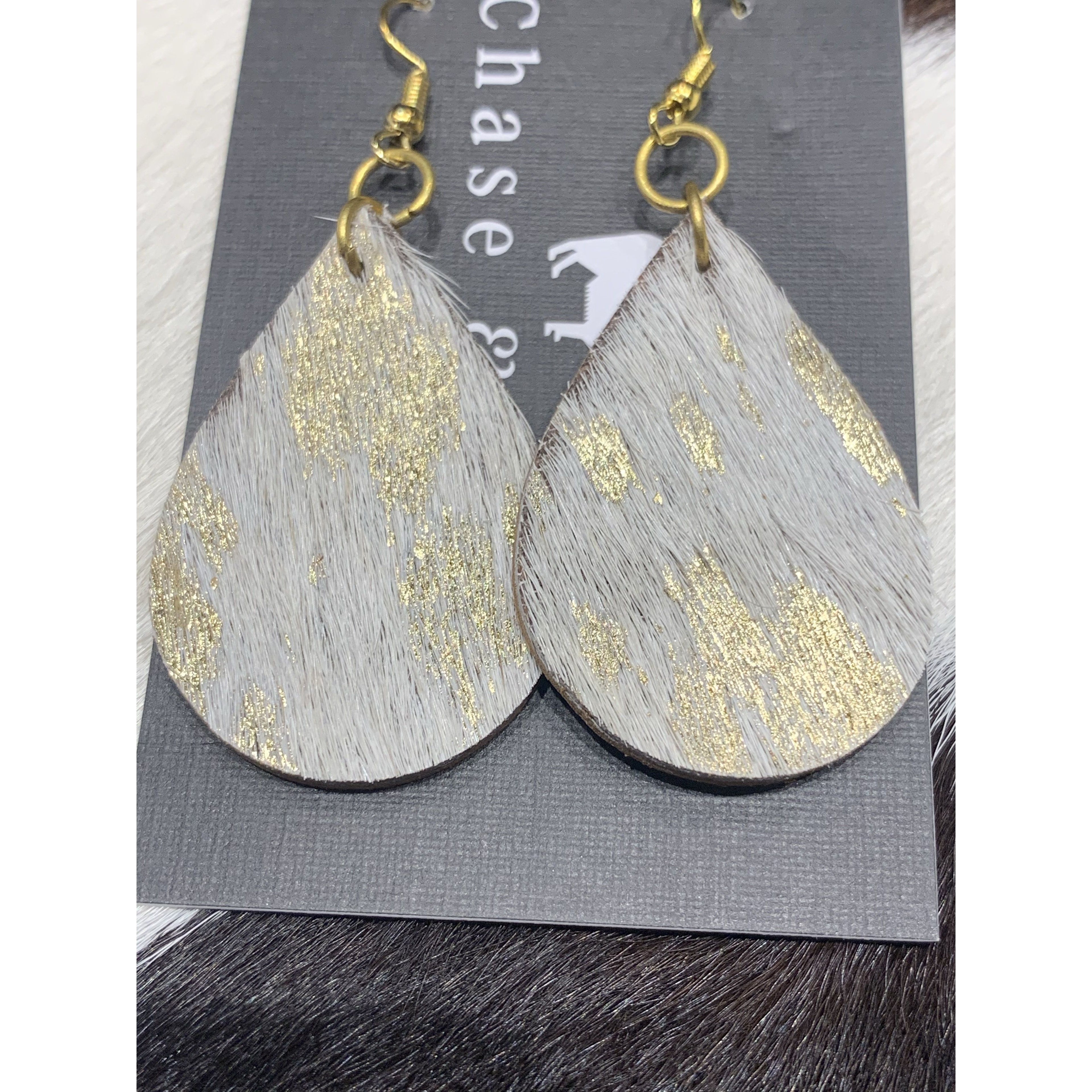 hide drop earrings white and gold assorted 