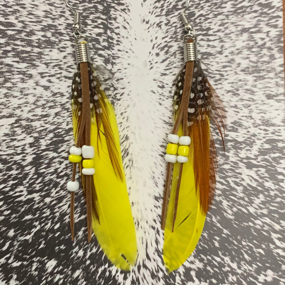 Yellow feather earrings 