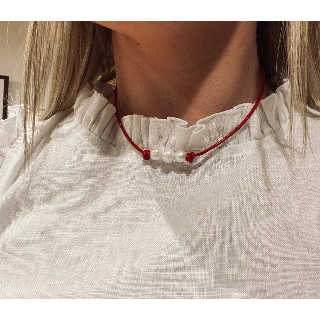 Pearls on Red leather